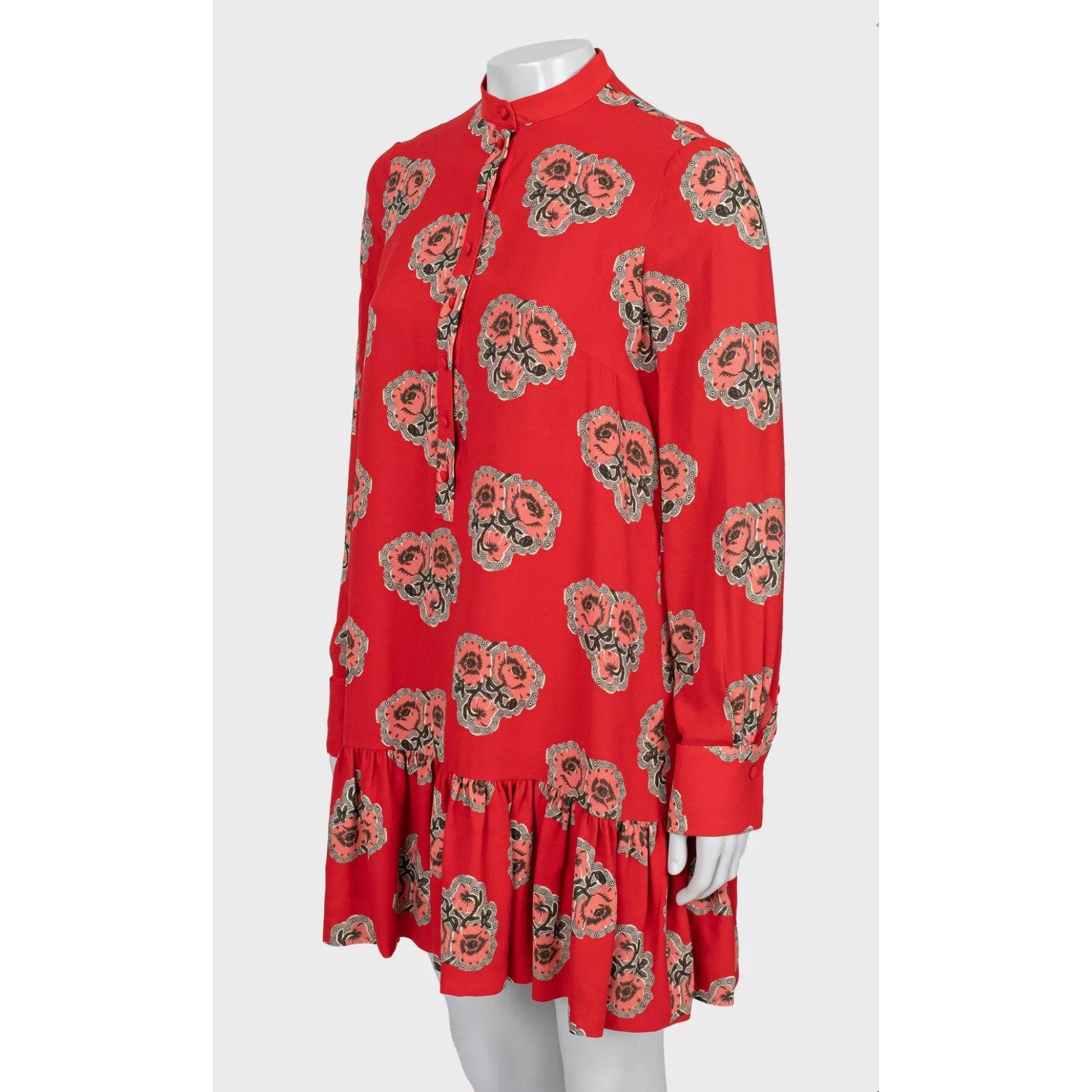Superbe minirobe Alexander McQueen à l'imprimé coquelicot rouge vif. Cette robe est confectionnée dans un luxueux crêpe 100 % soie et doublée de soie pour un confort optimal. Parfait pour faire une déclaration de mode audacieuse ! 

Condit :