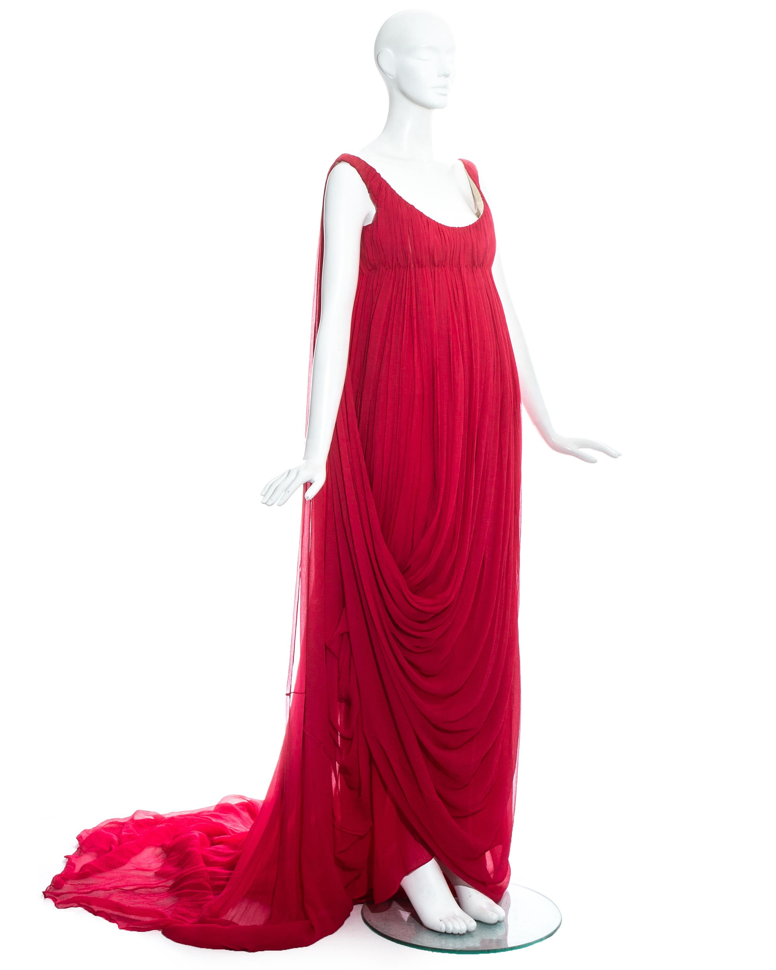 Alexander McQueen red crinkled silk chiffon empire evening dress with long train, structured bust and draped skirt.   

Fall-Winter 2008