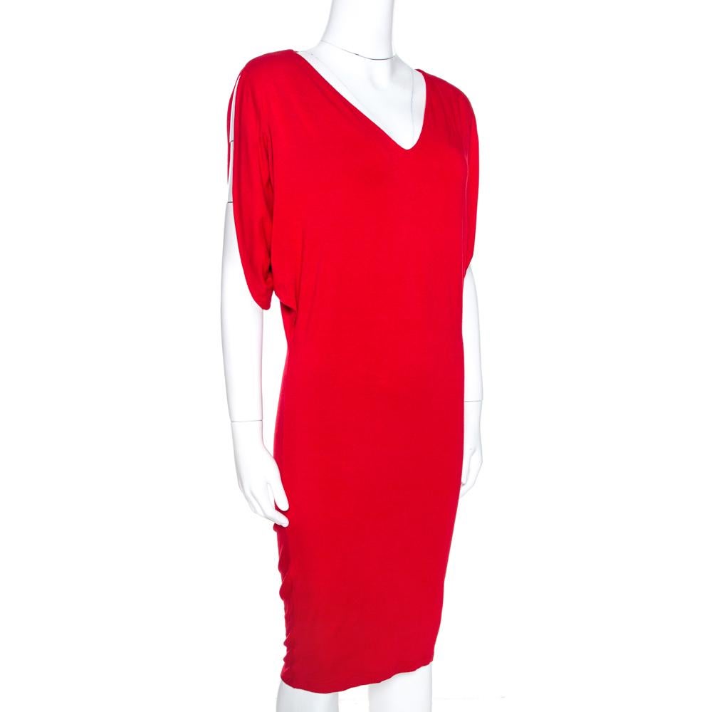 This stylish dress comes from the house of Alexander McQueen. Crafted from quality materials, this knit dress comes in a striking shade of red. It has a deep neck, fitted silhouette and a good fit. It is great for casual outings with friends. Pair