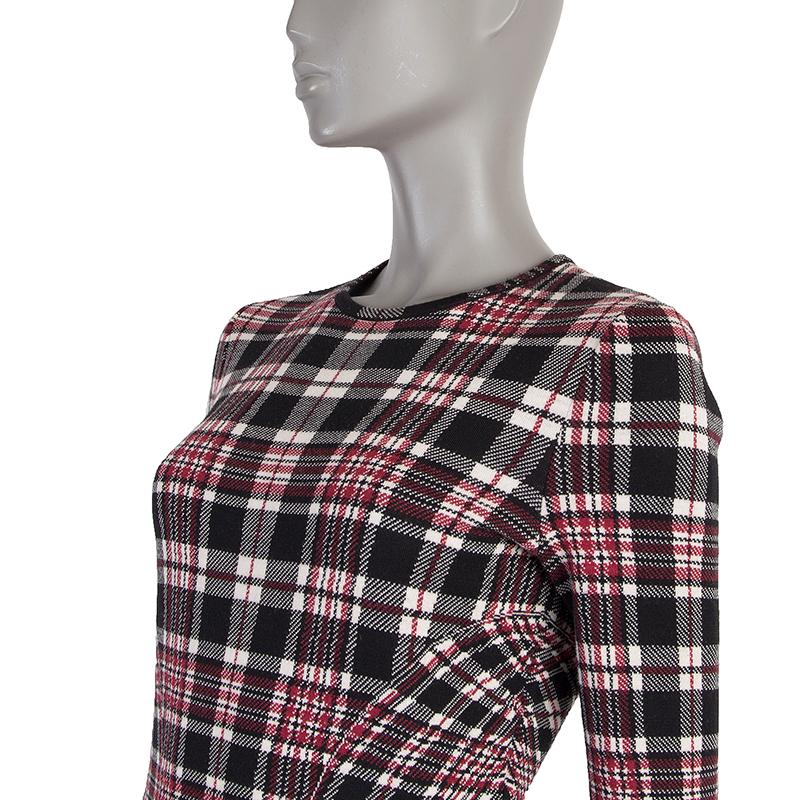 Alexander McQueen tartan 3/4-sleeve sheath dress in black, white red wool (100%). Unlined. Has been worn and is in excellent condition.

Tag Size L
Size L
Shoulder Width 39cm (15.2in)
Bust 88cm (34.3in) to 96cm (37.4in)
Waist 72cm (28.1in) to 82cm