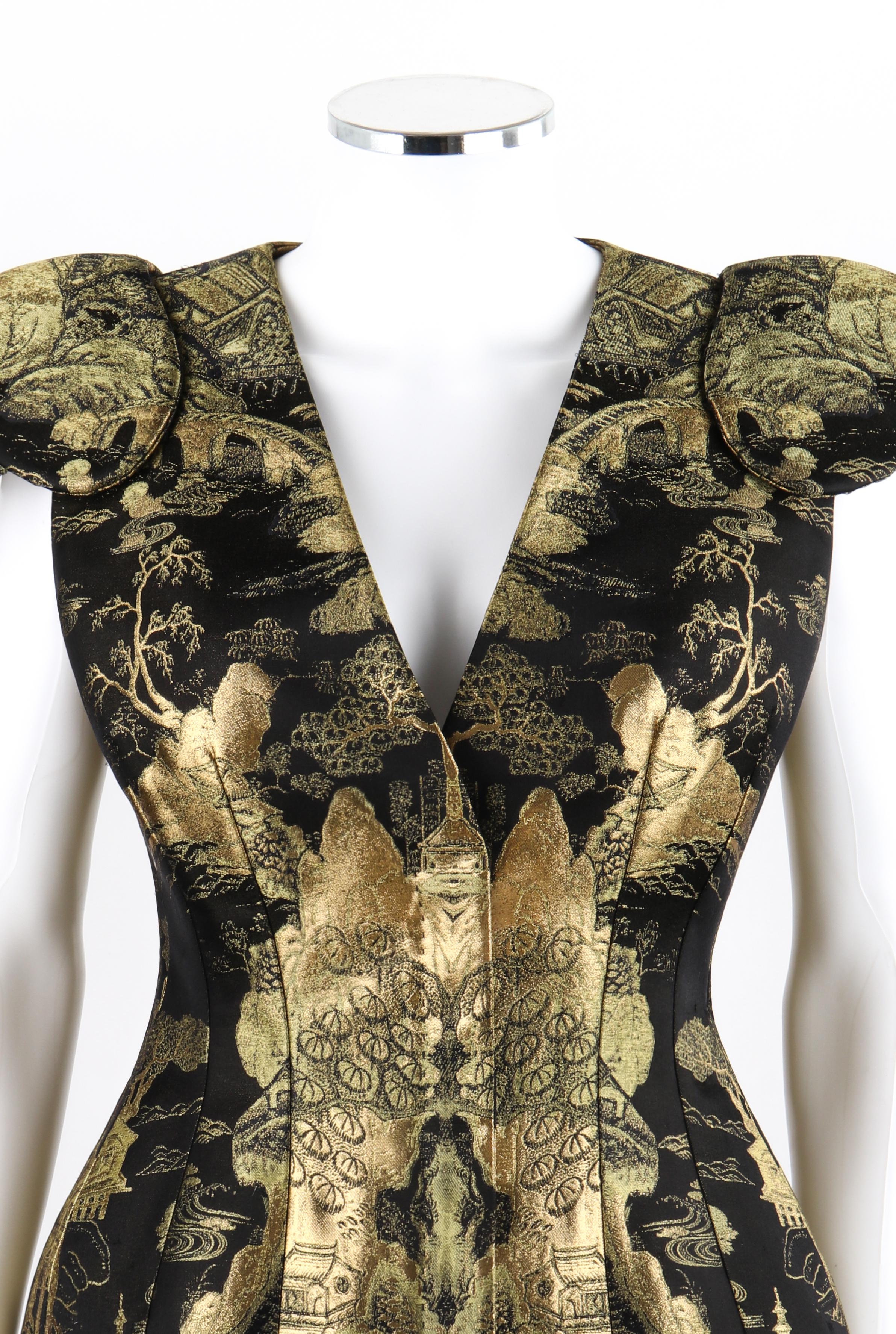 ALEXANDER McQUEEN Resort 2011 Black Gold Brocade Armour Sleeve Zip Up Jacket Top
 
Brand / Manufacturer: Alexander McQueen
Collection: Resort 2011
Designer: Sarah Burton
Style: Sleeveless jacket top
Color(s): Shades of black, gold
Lined: Yes
Marked