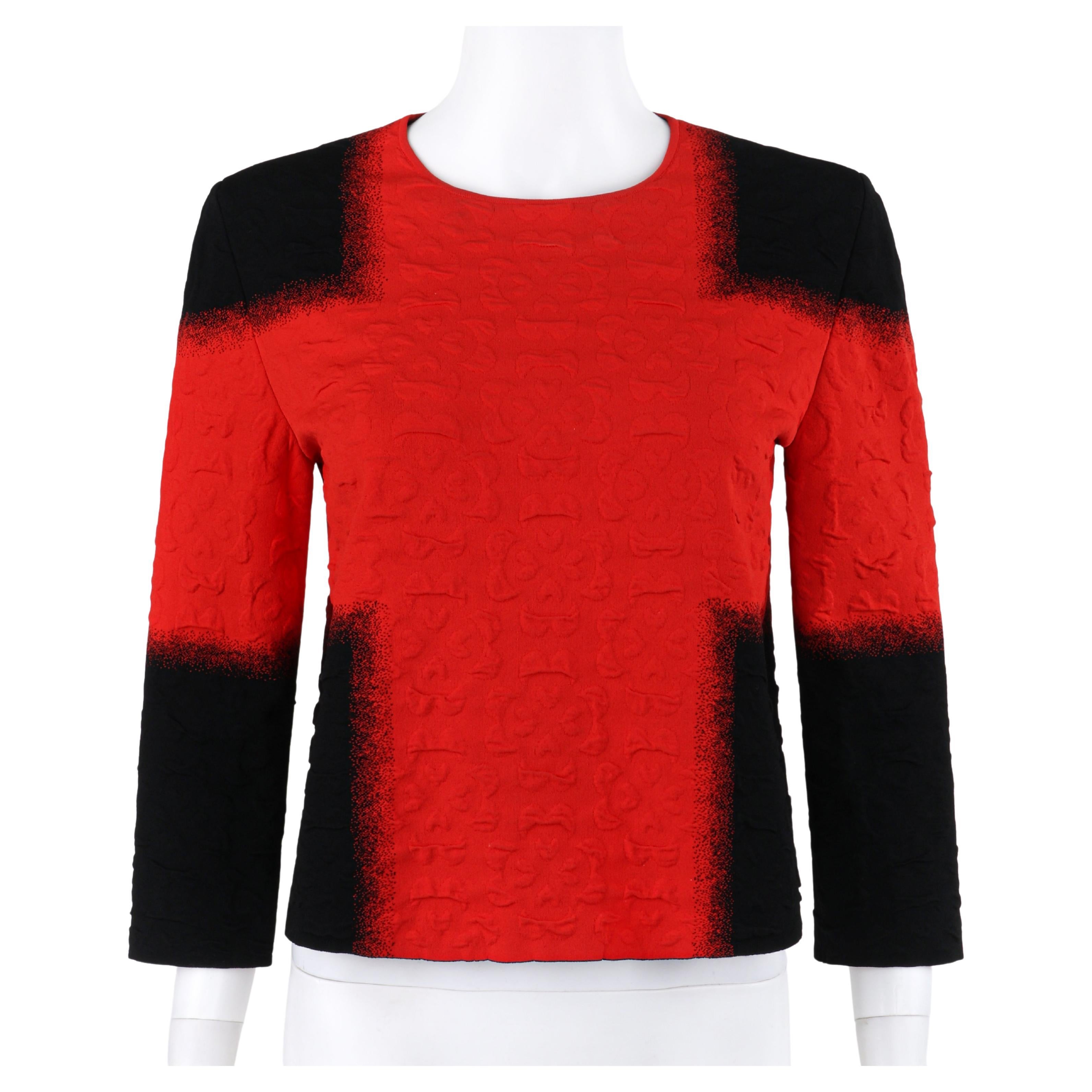 ALEXANDER McQUEEN Resort 2015 Black Red Embossed Stretch Knit Colorblock Top 

Brand / Manufacturer: Alexander McQueen
Collection: Resort 2015
Designer: Sarah Burton
Style: Long sleeve top
Color(s): Shades of Black, red
Lined: No
Marked Fabric