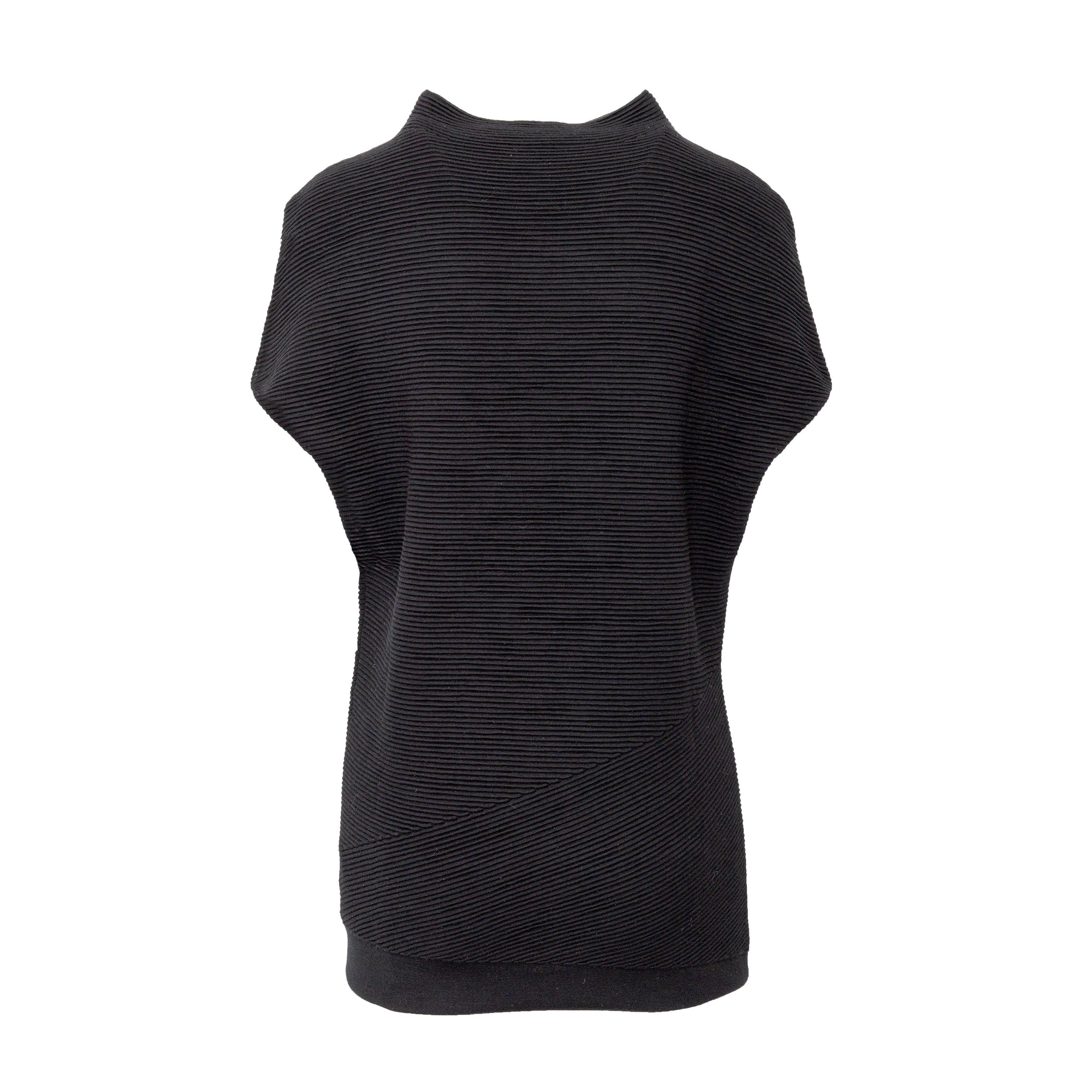 Effortlessly chic and versatile, this Alexander McQueen top is crafted in wool with a chic ribbed pattern. The black long top features a high neck and short sleeves for a contemporary look. With its relaxed shoulder and long design, this top can