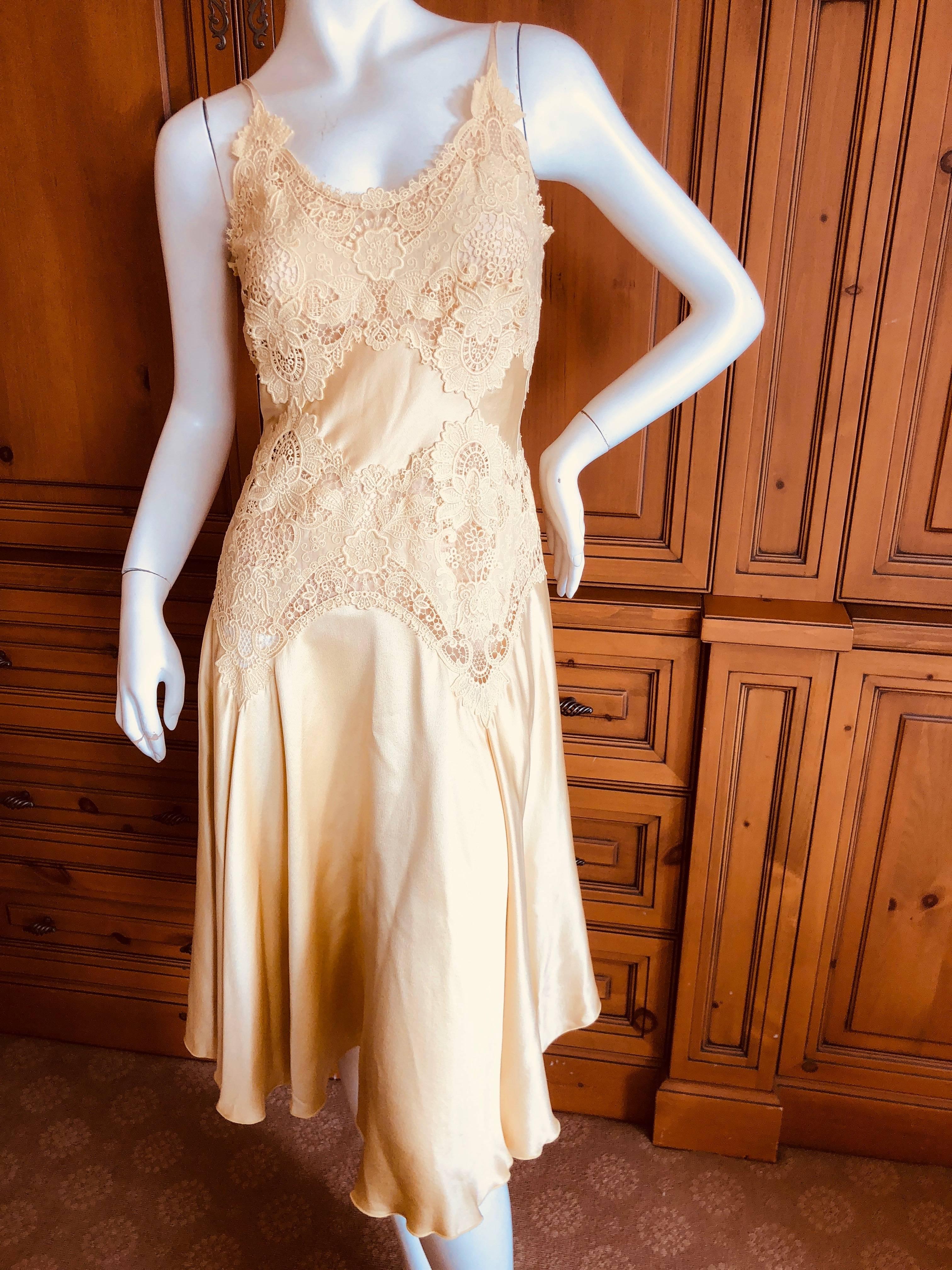 Alexander McQueen Butter Yellow Vintage Dress with Sheer Guipure Lace Details. 
From 2005.
This is such a pretty piece, and I have never seen it in this color, I usually get it in black or  navy blue.
Size 38
 Bust: 36