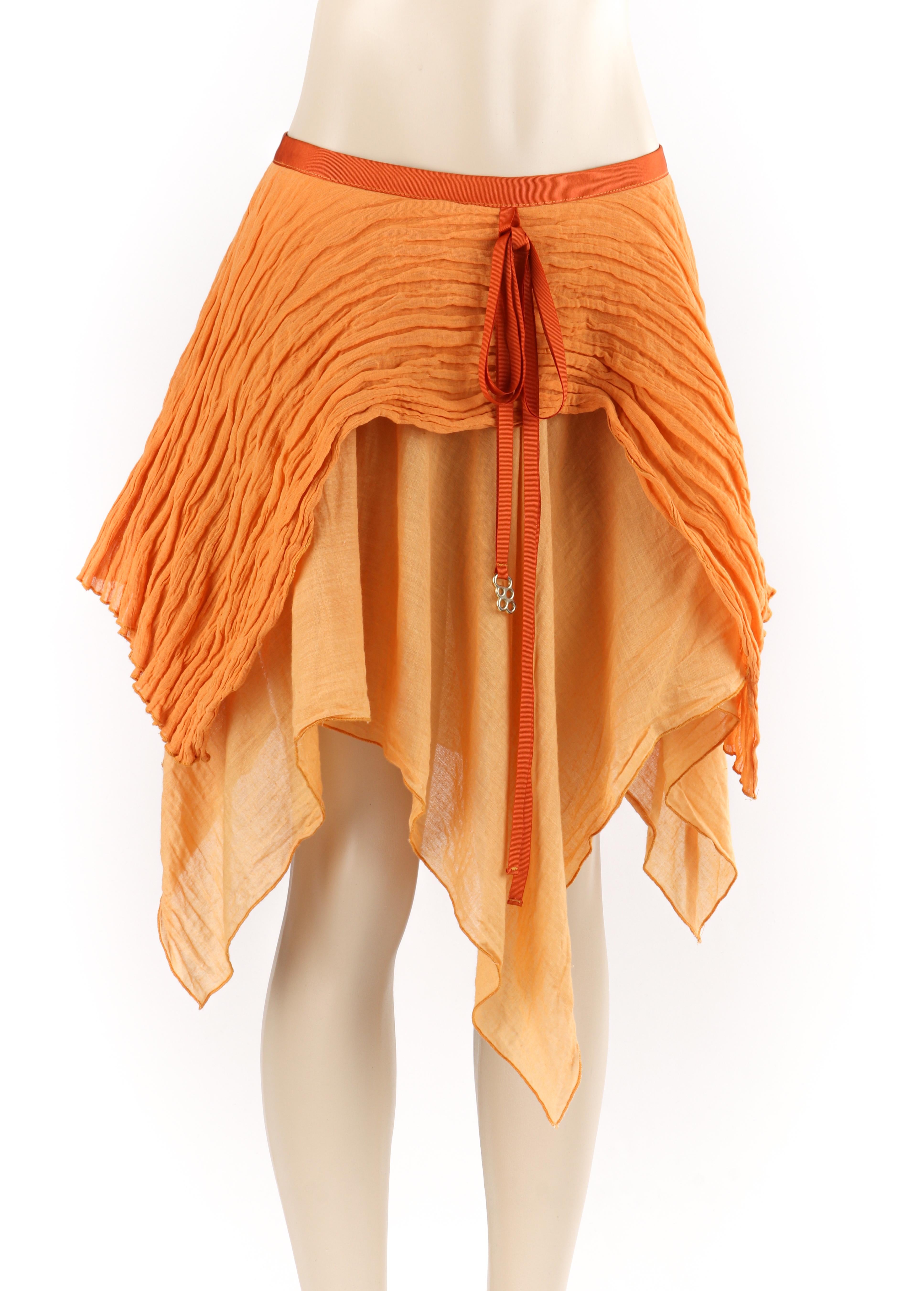 ALEXANDER McQUEEN S/S 1995 Two Toned Orange Layered Asymmetric Ruffled Skirt 
 
Brand / Manufacturer: Alexander McQueen
Collection: S/S 1995 
Style: Skirt
Color(s): Shades of orange
Lined: Yes
Marked Fabric Content: “85% CO (cotton), 15% ME