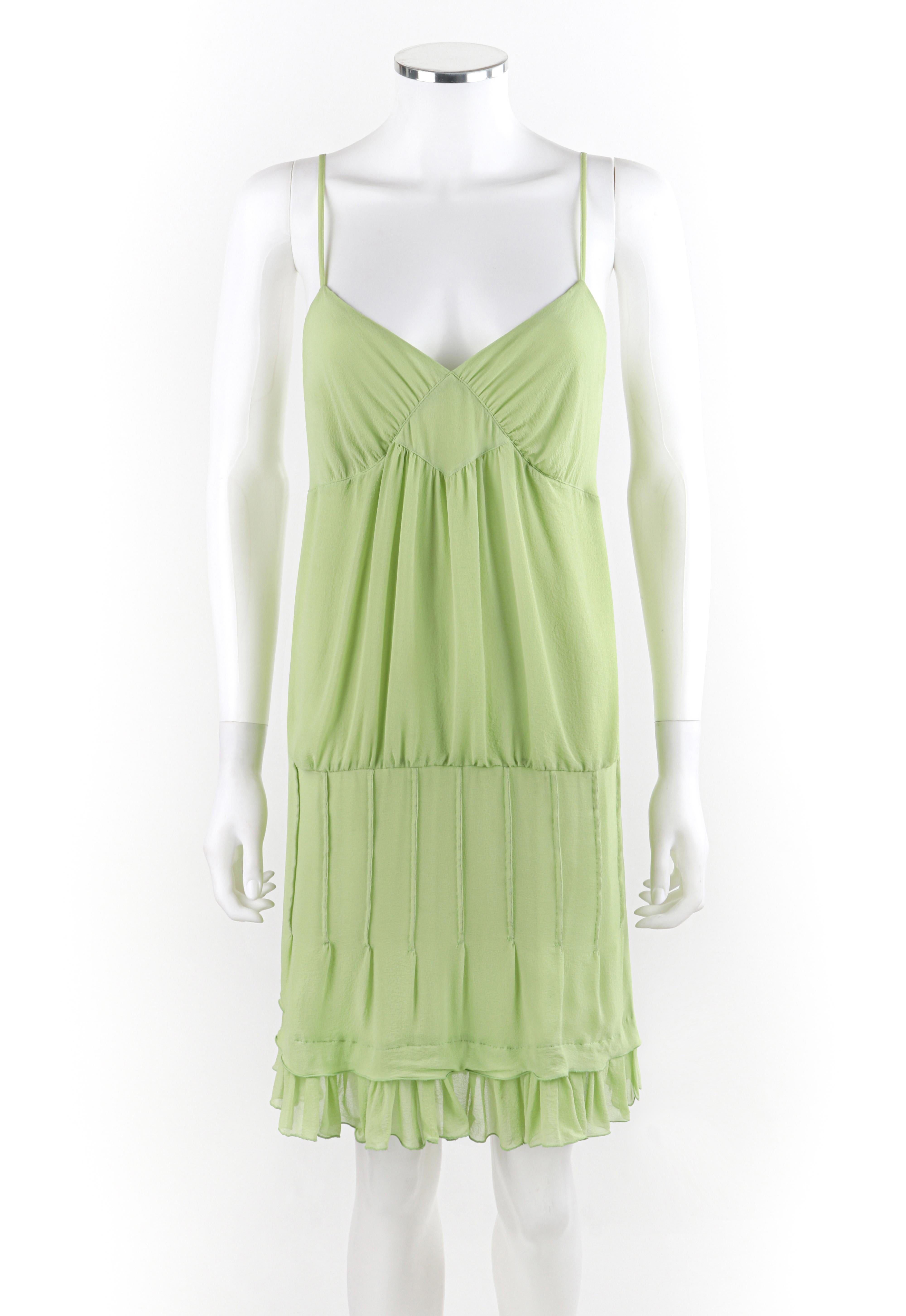 ALEXANDER MCQUEEN S/S 1996 Chartreuse Ruffles Tiered V-neck Pleated Sundress 
 
Brand / Manufacturer: Alexander McQueen
Collection: S/S 1996
Style: Tiered Sundress
Color(s): Chartreuse 
Lined: No
Marked Fabric Content: Silk
Additional Details /