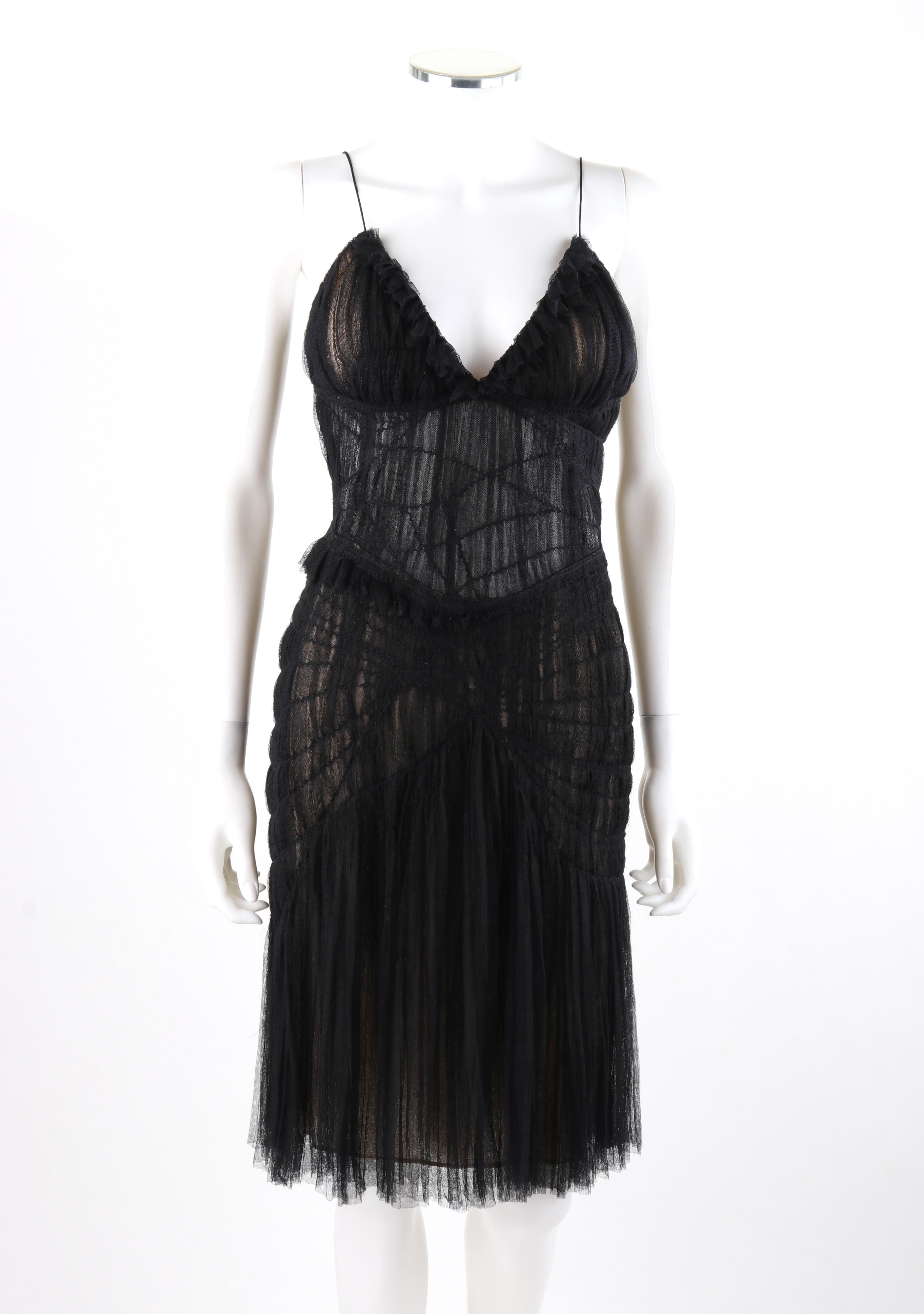 ALEXANDER McQUEEN S/S 2003 “Irere” Black Gathered Layer Tulle Mesh V Neck Dress


Brand / Manufacturer: Alexander McQueen
Collection: S/S 2003 “Irere”
Designer: Alexander McQueen
Style: Spaghetti strap gathered tulle mesh dress
Color(s): Shades of
