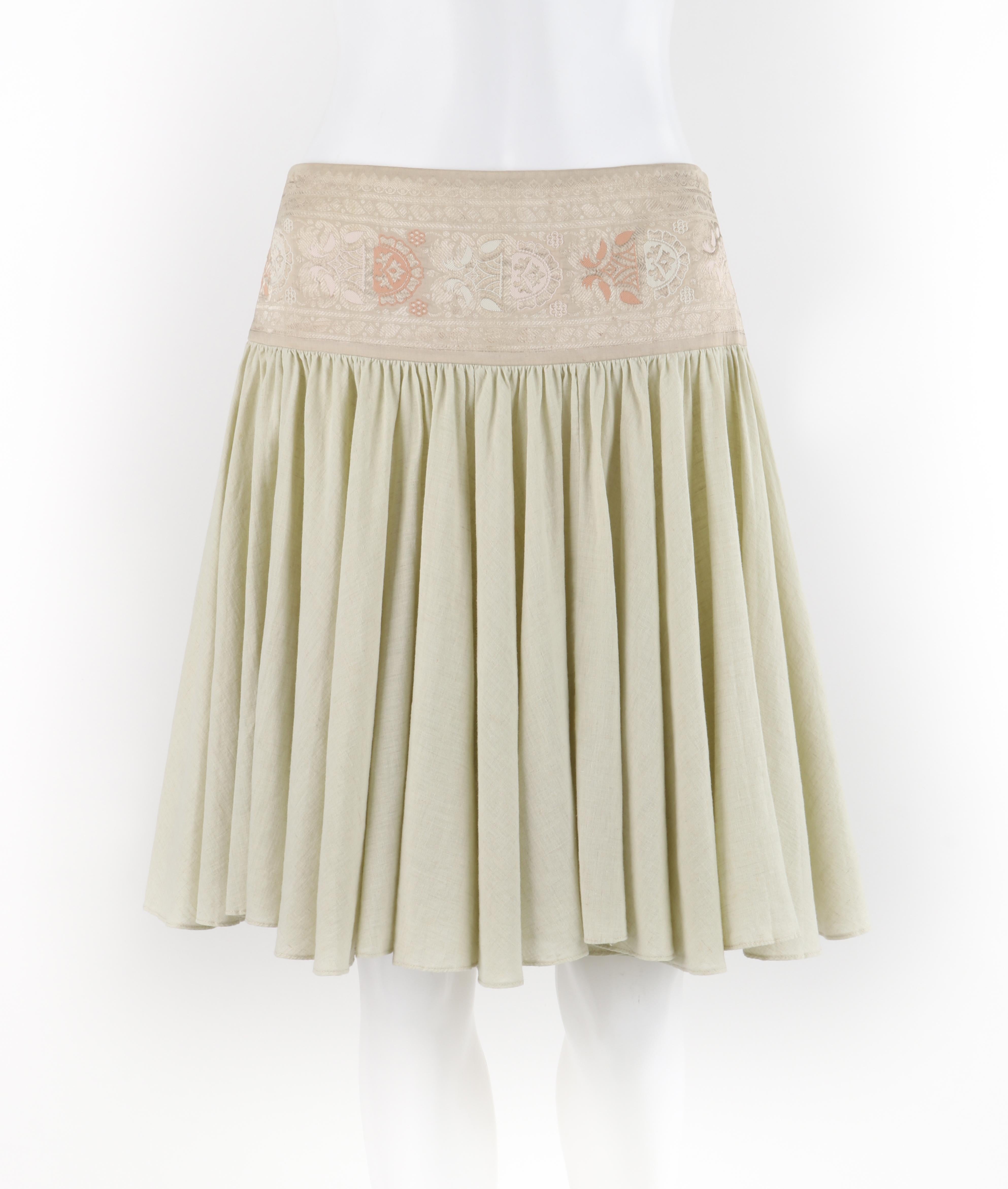 Brand / Manufacturer: Alexander McQueen
Collection: S/S 2005
Designer: Alexander McQueen 
Style: Circle Skirt
Color(s): Shades of beige, pink, white, tan
Lined: No
Marked Fabric Content: 