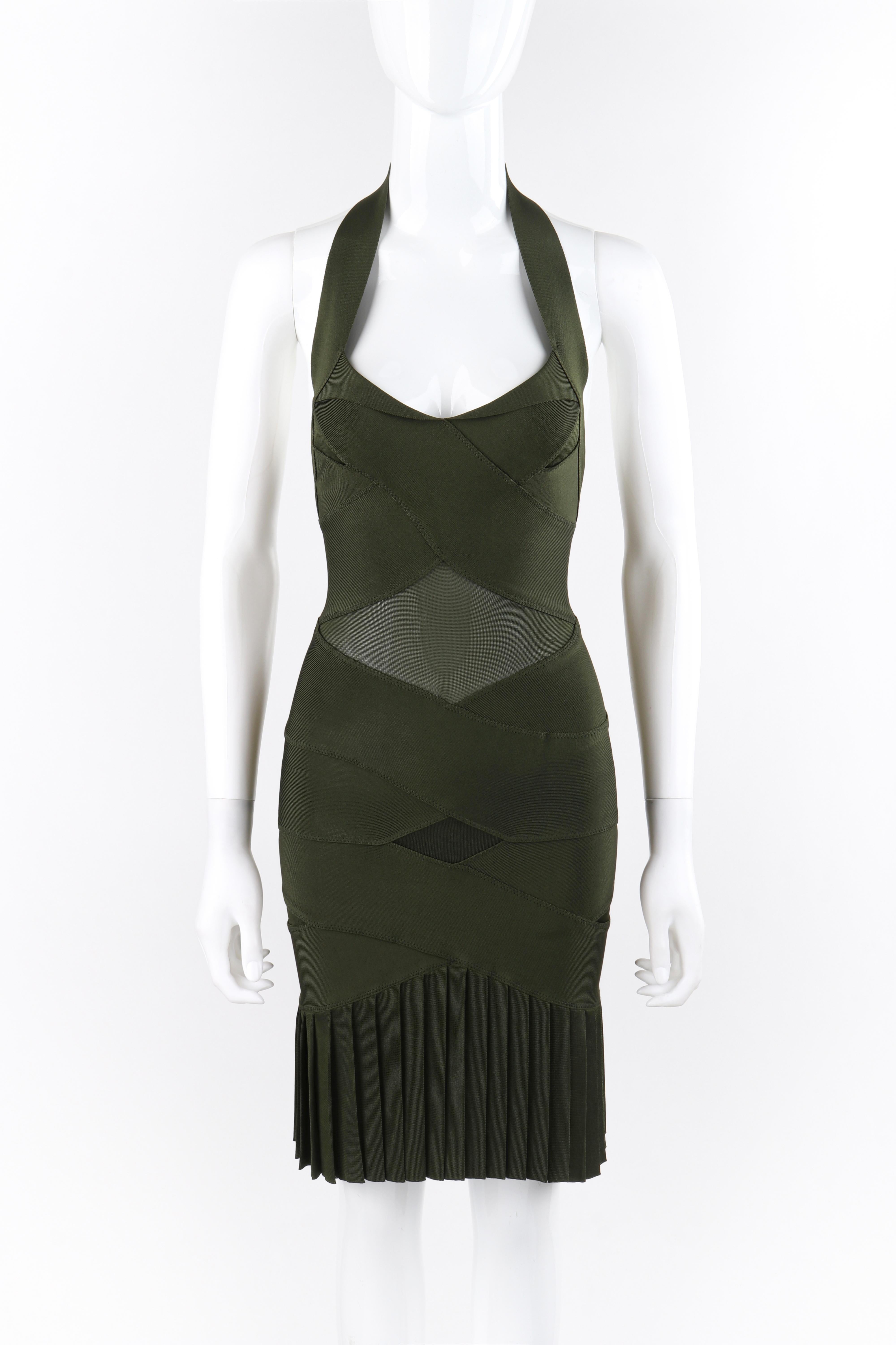 ALEXANDER McQUEEN S/S 2006 “Neptune” Green Pleated Bandage Cutout Halter Dress
 
Brand / Manufacturer: Alexander McQueen
Collection: S/S 2006 “Neptune”- Runway look #48
Designer: Alexander McQueen 
Style: Halter dress
Color(s): Green
Lined: