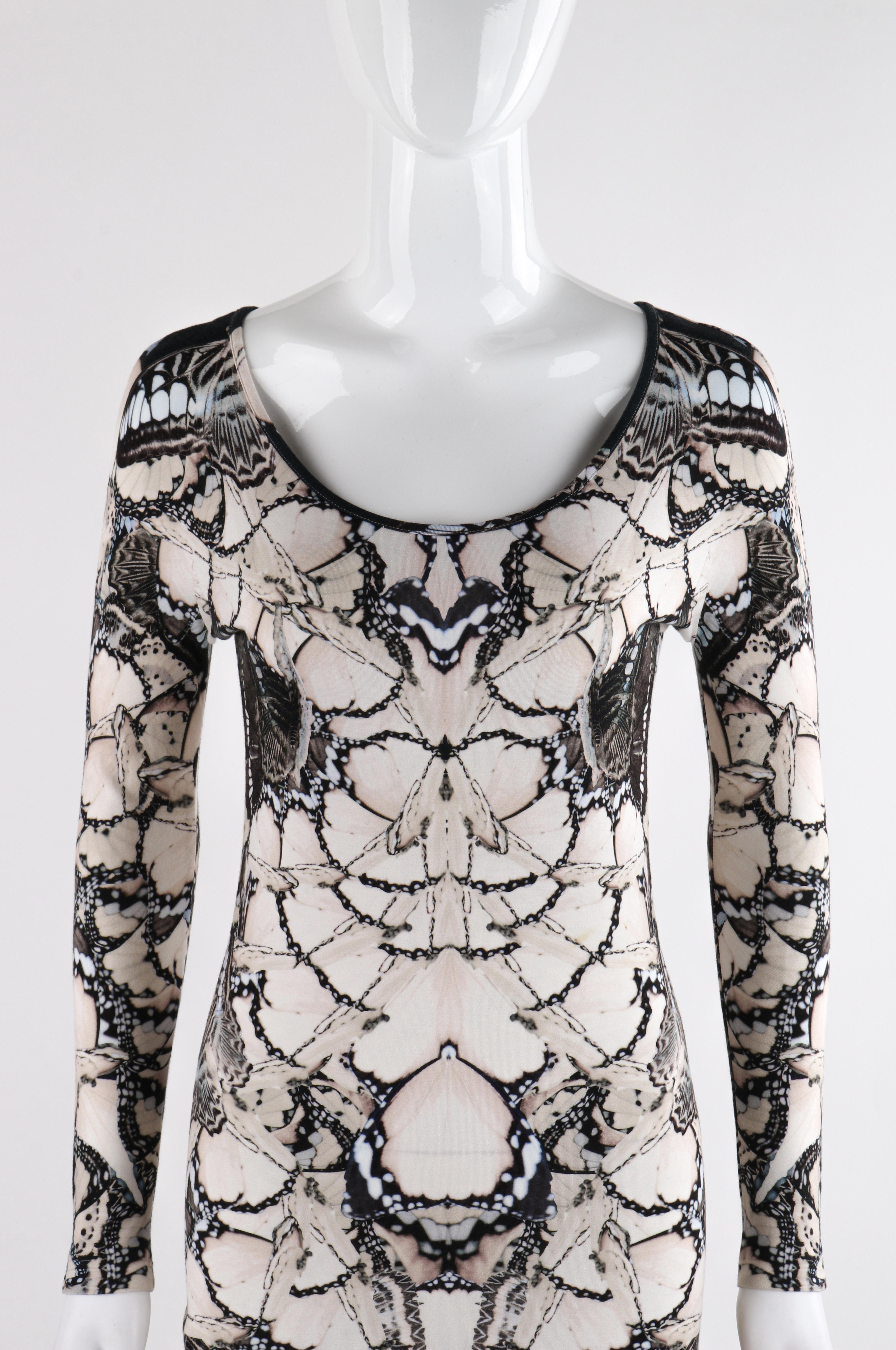 ALEXANDER McQUEEN S/S 2011 Black White Cream Butterfly Print Knit Sheath Dress

Brand / Manufacturer: Alexander McQueen
Collection: S/S 2011
Designer: Sarah Burton
Style: Knit sheath dress; long sleeves
Color(s): Shades of black, white, and off