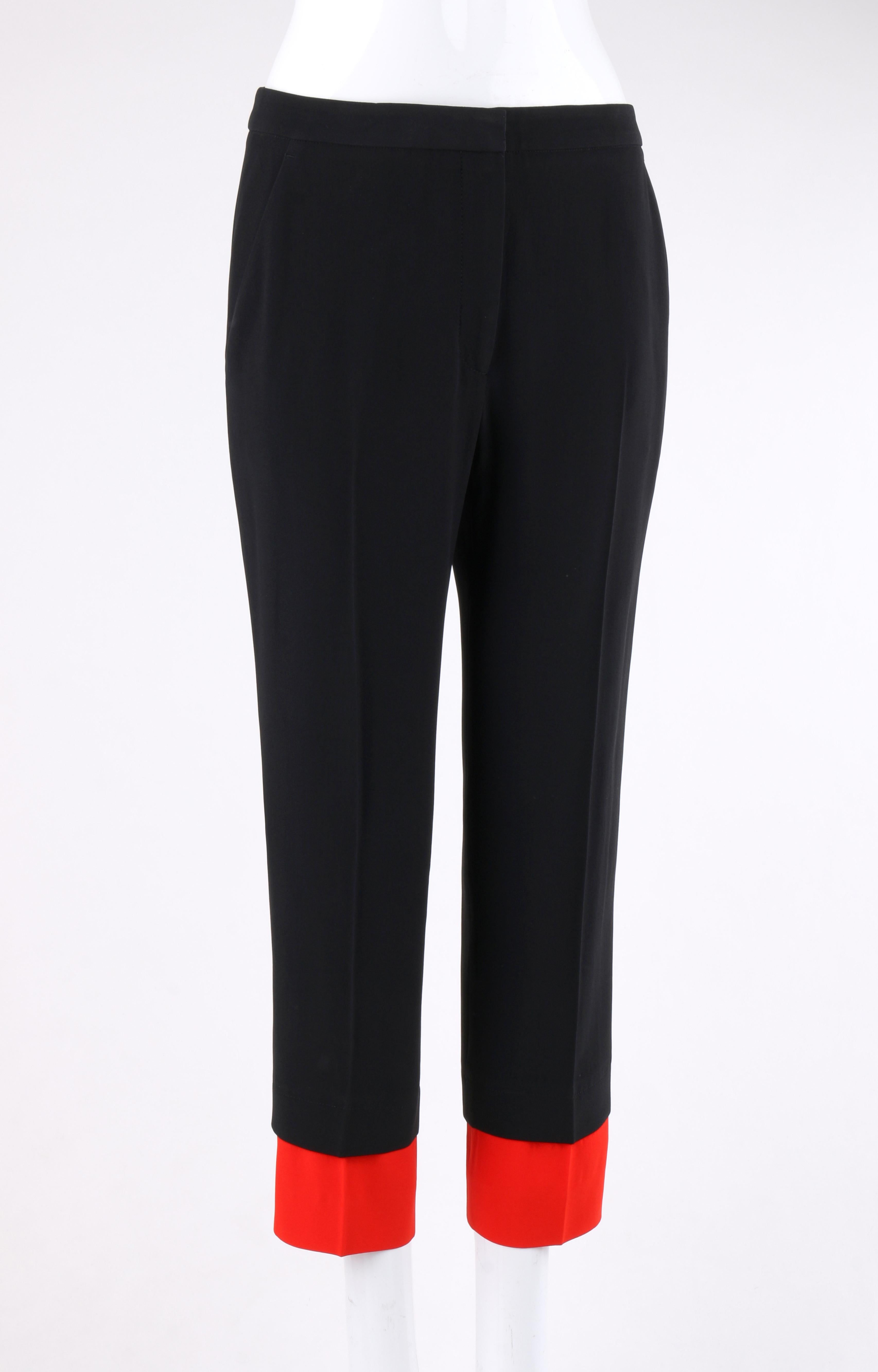 ALEXANDER McQUEEN S/S 2014 Black & Red Cropped Trouser Pant Slacks
  
Brand / Manufacturer: Alexander McQueen
Collection: Spring / Summer 2014
Designer: Sara Burton
Style: Cropped pants / slacks
Color(s): Black, red (exterior, interior)
Lined: