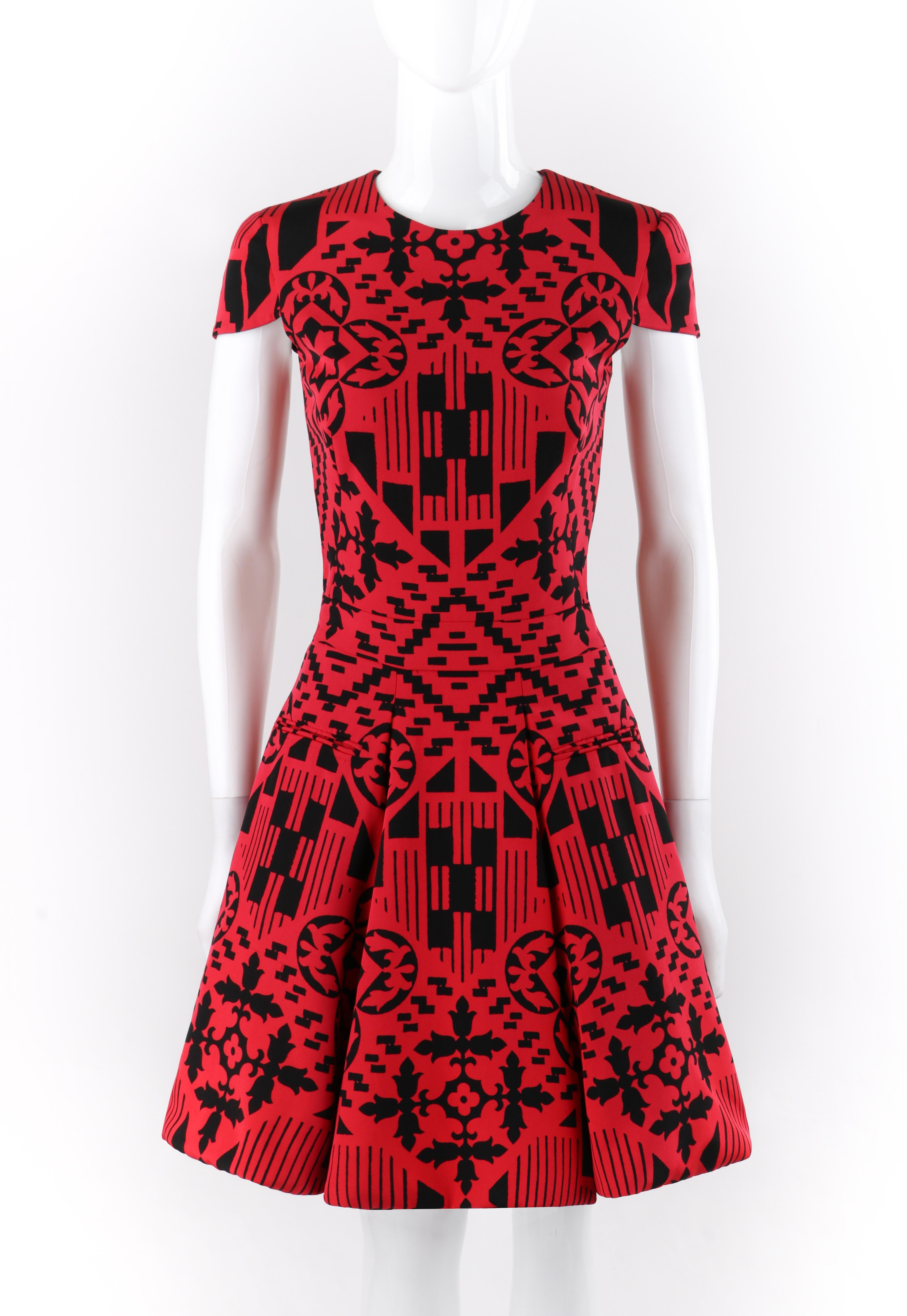 ALEXANDER McQUEEN S/S 2014 Red Black Mosaic Shape Print Fit N Flare Skater Dress

Brand / Manufacturer: Alexander McQueen
Collection: S/S 2014 
Designer: Sarah Burton
Style: Pleated fit n flare skater style dress; cap sleeves
Color(s): Red and