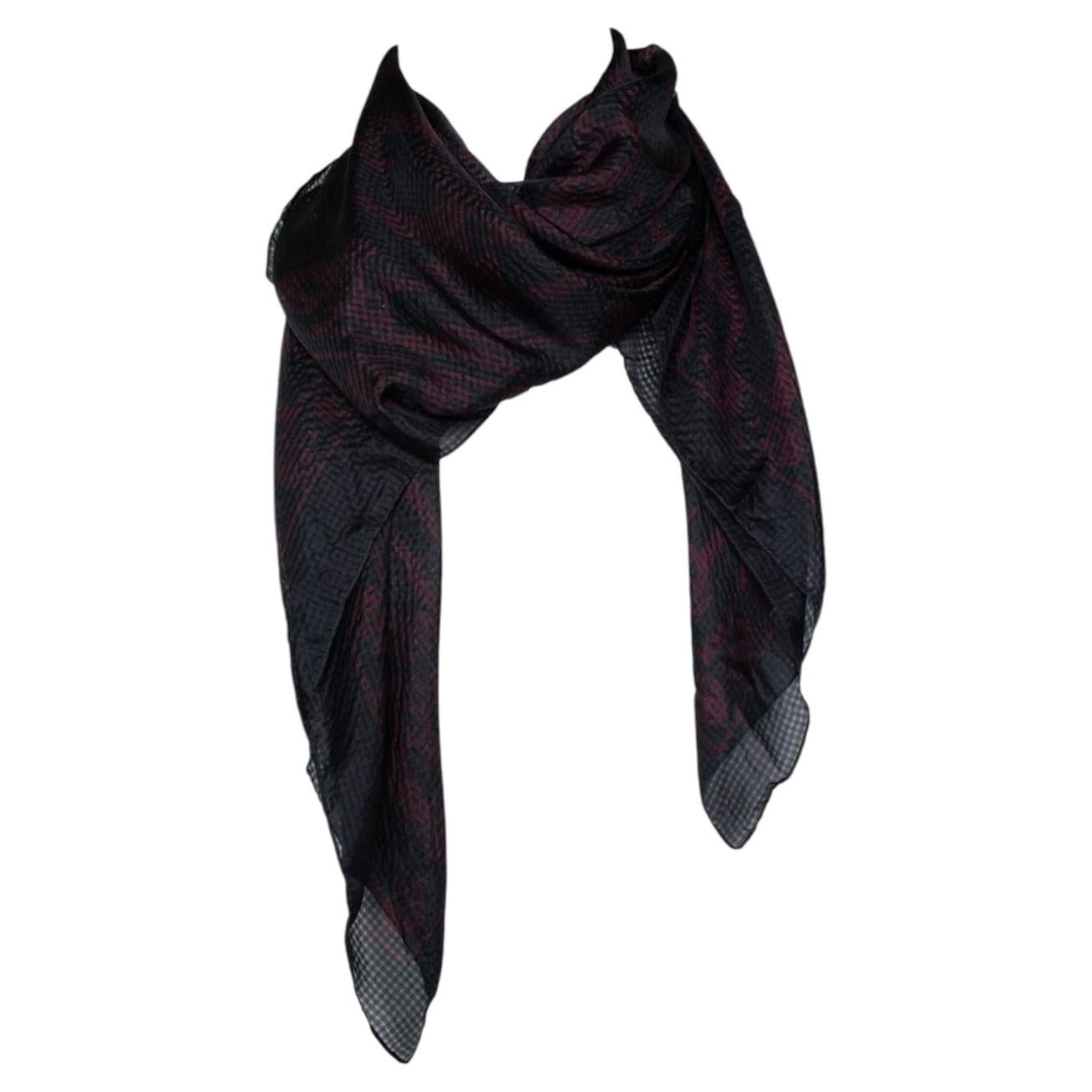 How do I tell if it’s an authentic Alexander McQueen scarf?