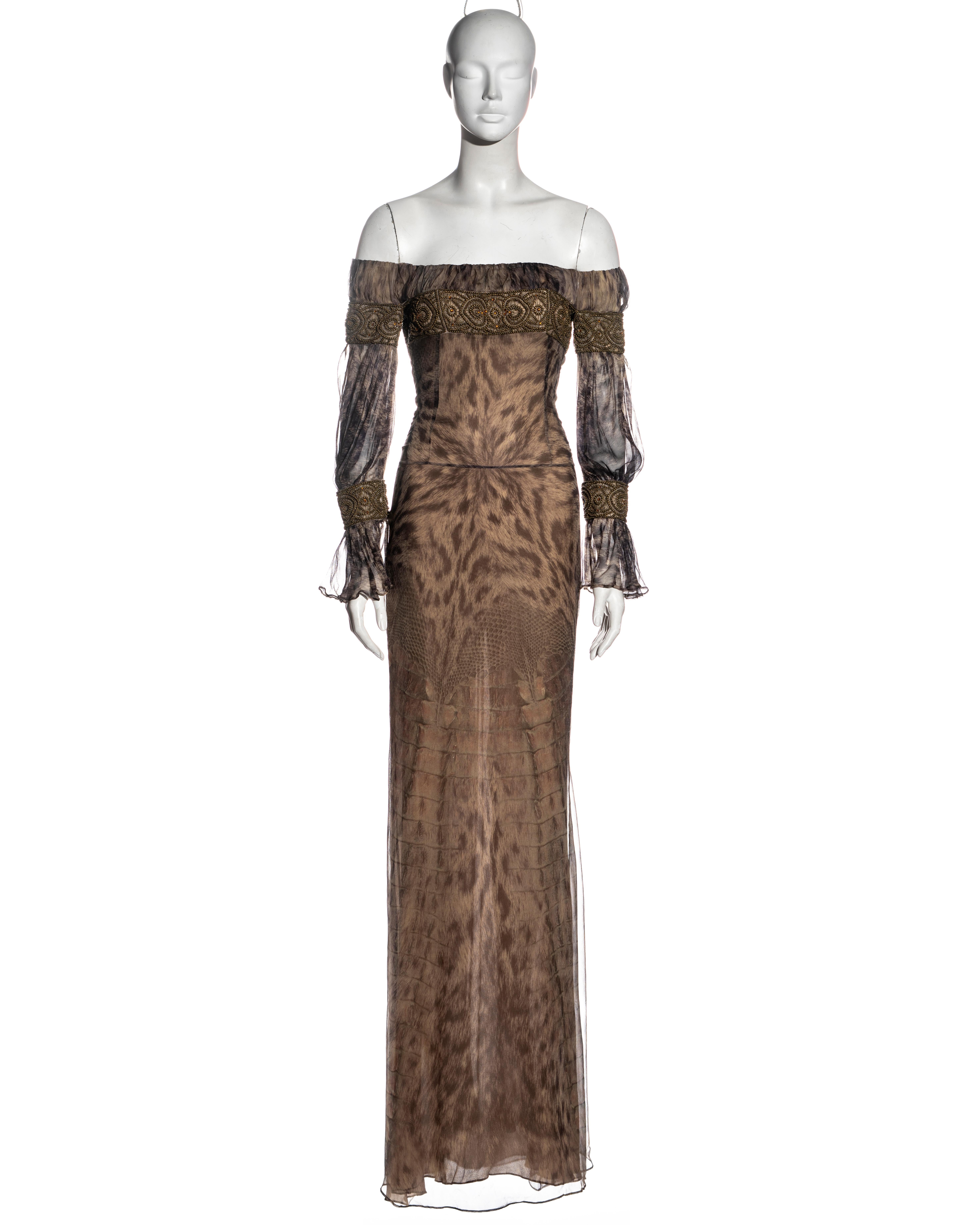 ▪ Alexander McQueen silk evening dress
▪ Brass beaded bands with amber stones 
▪ Long full sleeves gathered at the top and cuffs 
▪ Montage animal print 
▪ Floor-length skirt 
▪ IT 40 - FR 36 - UK 8 - US 4
▪ 'Pantheon as Lecum', Fall-Winter 2004
▪
