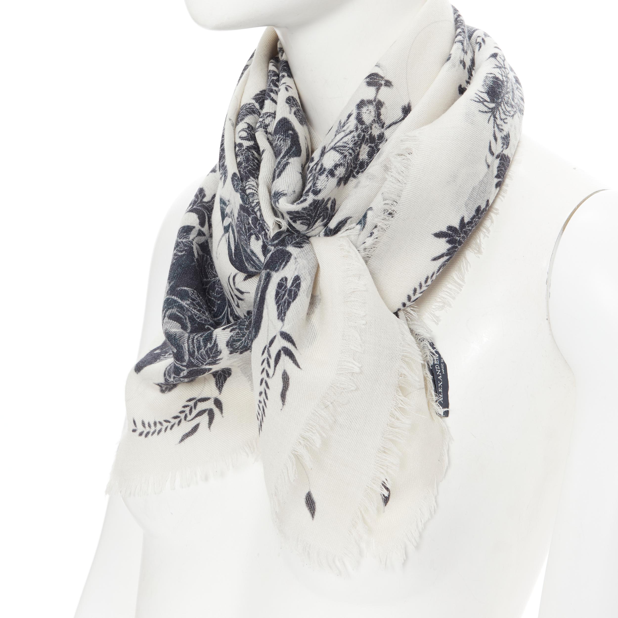 ALEXANDER MCQUEEN silk wool black white sull floral bordered print frayed scarf Reference: LNKO/A01803 
Brand: Alexander McQueen 
Designer: Alexander McQueen 
Material: Wool 
Color: White 
Pattern: Floral 
Extra Detail: White base with black print.