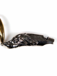 Alexander McQueen - Boucles d'oreilles en argent avec tête de mort en forme de chien