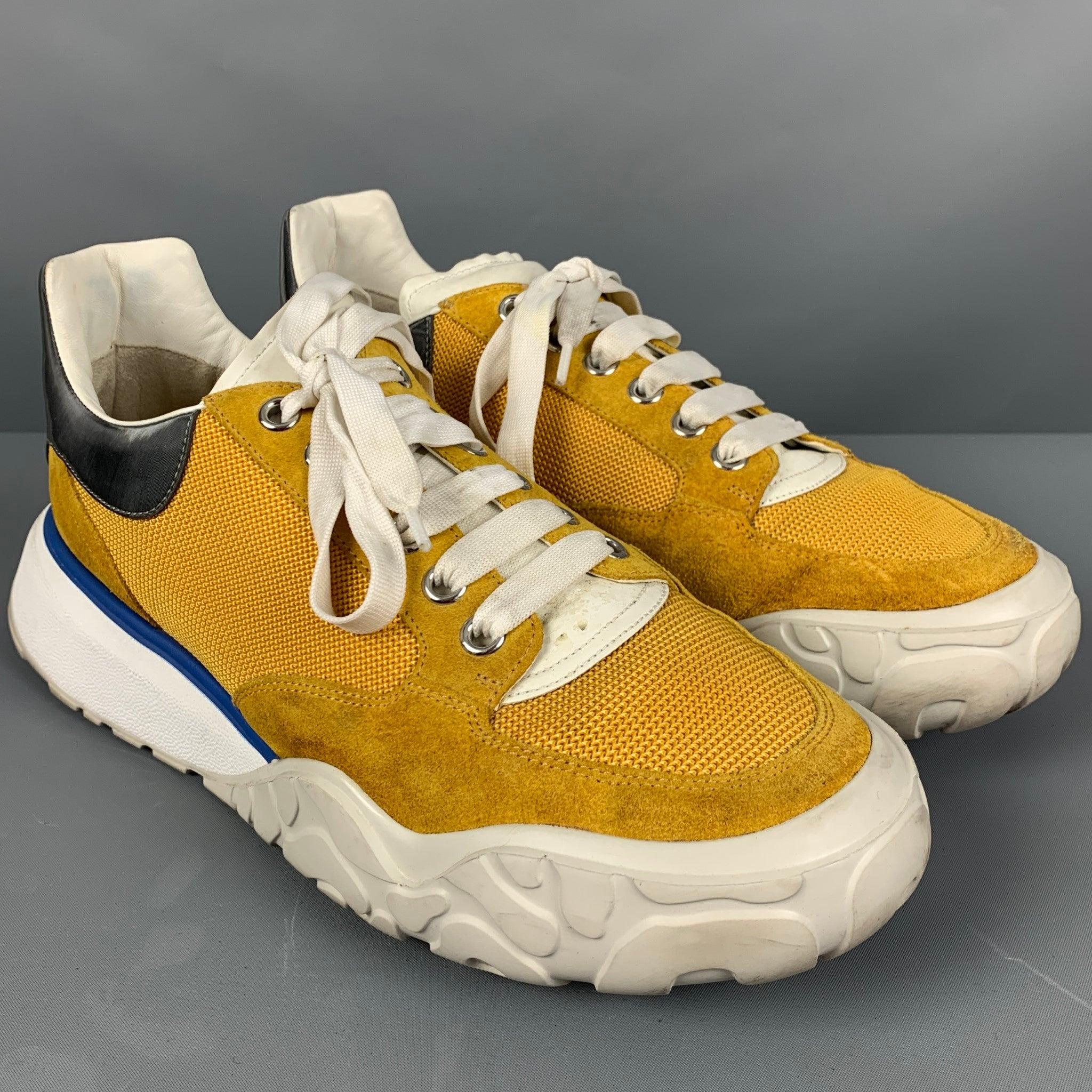 ALEXANDER MCQUEEN sneakers
in a yellow nylon fabric featuring color block style, yellow suede trim, and grey heel detail.Good Pre-Owned Condition. Missing insole. As-is. 

Marked:   711127 44 JOutsole:13.25 inches  x 4.5 inches 
  
  
 
Reference: