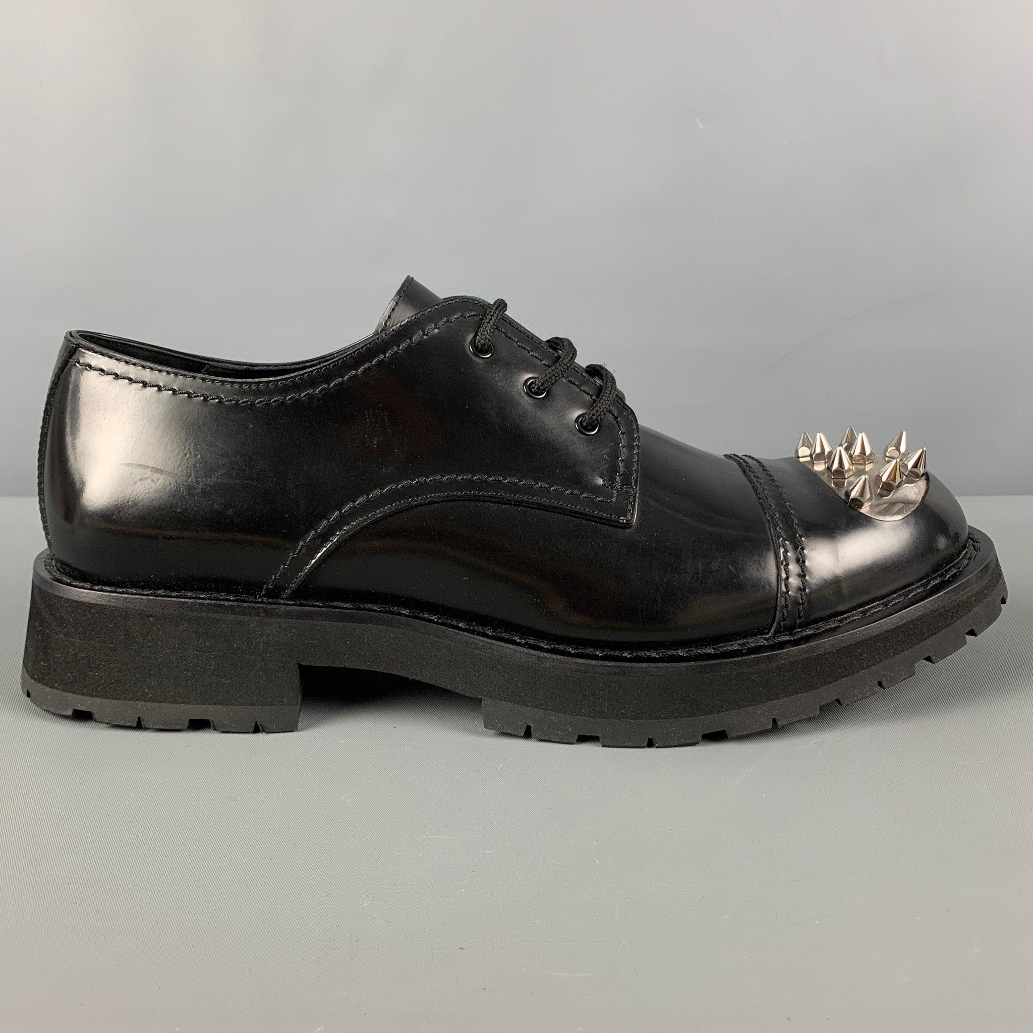 ALEXANDER McQUEEN shoes comes in a black leather featuring a silver tone spike toe design, cap toe, chunky sole, and a lace up closure. Includes box. Made in Italy.
Excellent
Pre-Owned Condition. 

Marked:   45Outsole: 13.5 inches  x 5 inches 
  
 