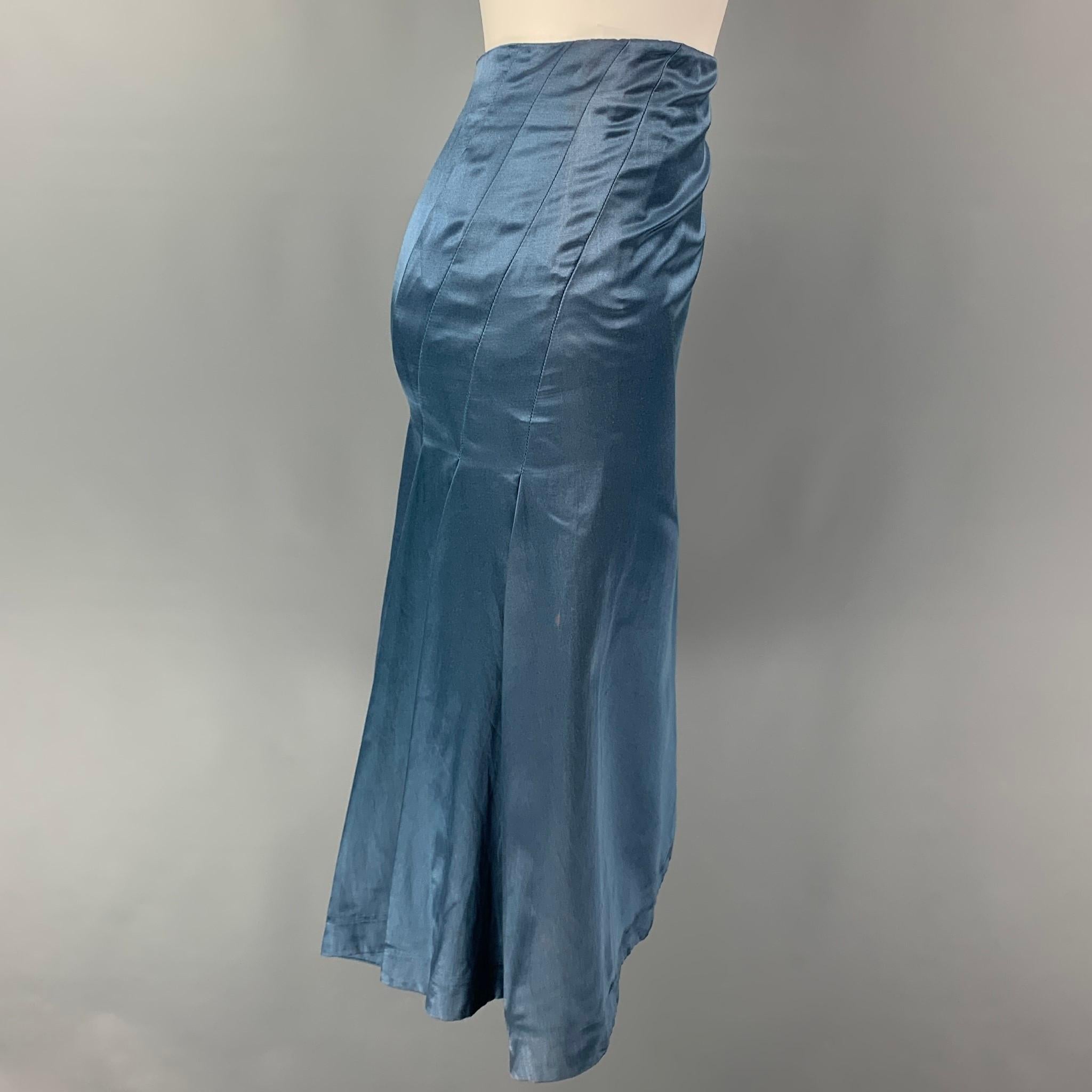 ALEXANDER McQUEEN skirt comes in a blue satin silk / cotton featuring a back pleated design and a back zip up closure. Made in Italy. 

Very Good Pre-Owned Condition. Light discoloration. As-Is.
Marked: 38

Measurements:

Waist: 28 in.
Hip: 33
