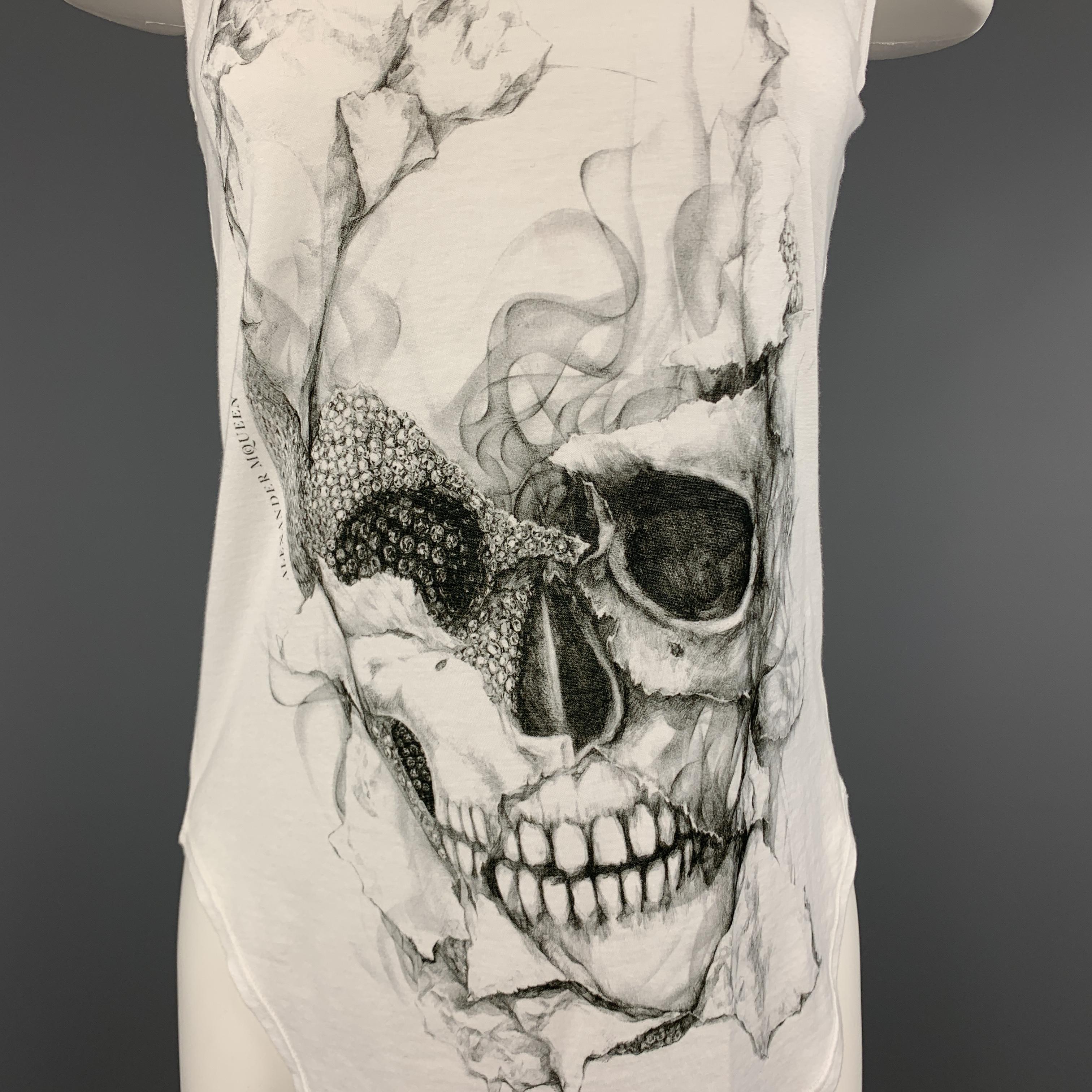 ALEXANDER MCQUEEN tank top comes in white burnout jersey with a black smoke skull graphic. Made in Italy.

Excellent Pre-Owned Condition.
Marked: IT 38

Measurements:

Shoulder: 10.5 in.
Bust: 34 in.
Length: 25.5 in.