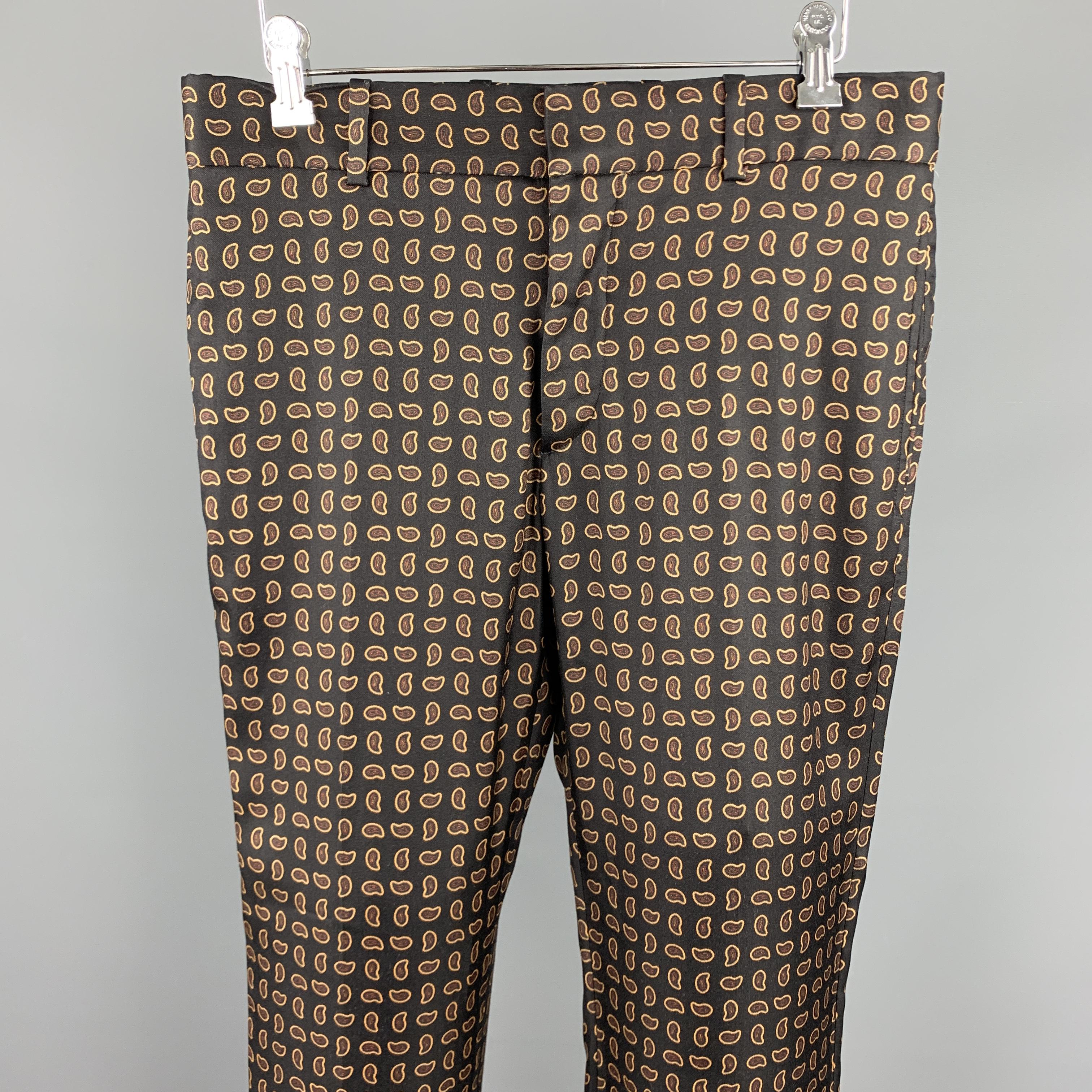 ALEXANDER MCQUEEN casual pants comes in a black wool with a all over paisley print featuring a flat front and a zip fly closure. Made in Romania.

Excellent Pre-Owned Condition.
Marked: 46

Measurements:

Waist: 32 in. 
Rise: 9 in. 
Inseam: 28 in. 