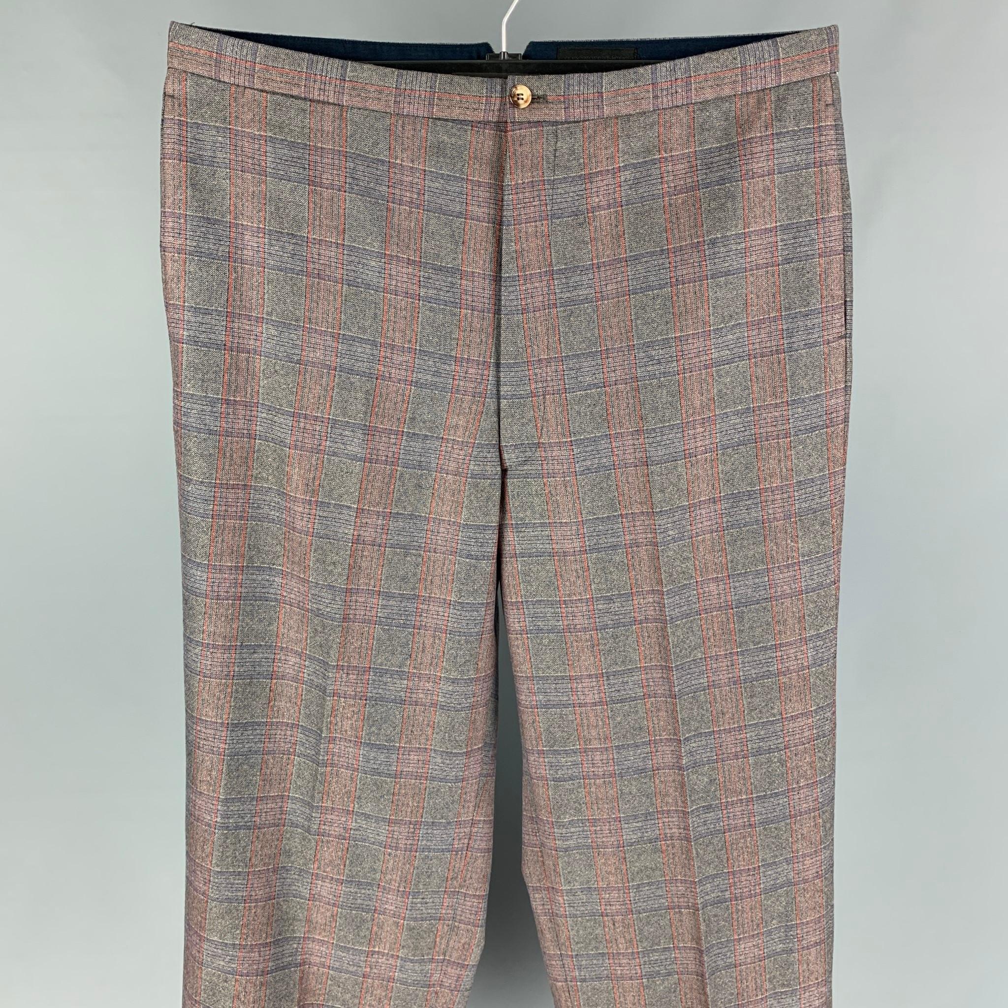 ALEXANDER McQUEEN dress pants comes in a gray plaid material featuring a flat front, zip fly, high waist, and a button closure. Made in Italy. 

Very Good Pre-Owned Condition. Fabric tag removed.
Marked: Size tag removed.

Measurements:

Waist: 36