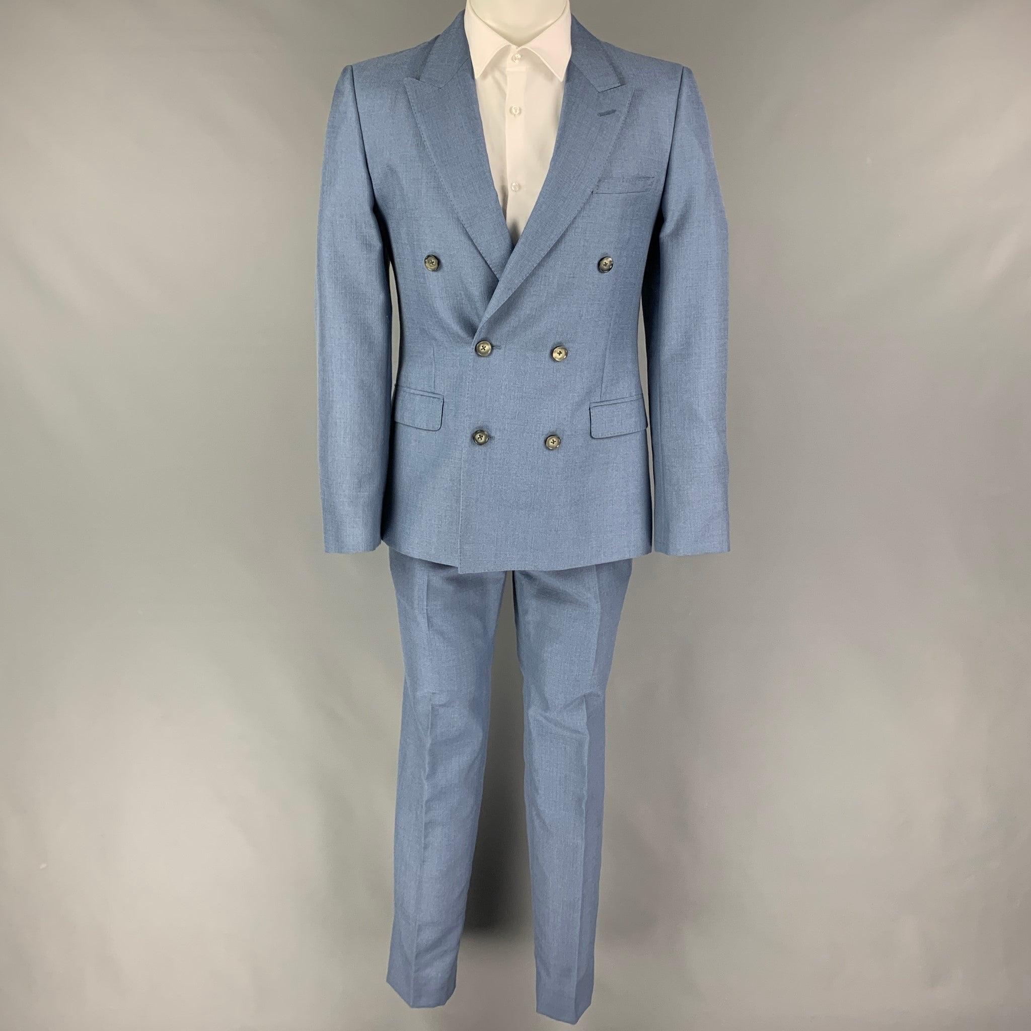 ALEXANDER McQUEEN
suit comes in a blue mohair / silk with a full liner and includes a double breasted sport coat with a peak lapel and matching flat front trousers. Made in Italy. Excellent Pre-Owned Condition. 

Marked:   48 

Measurements: 
 