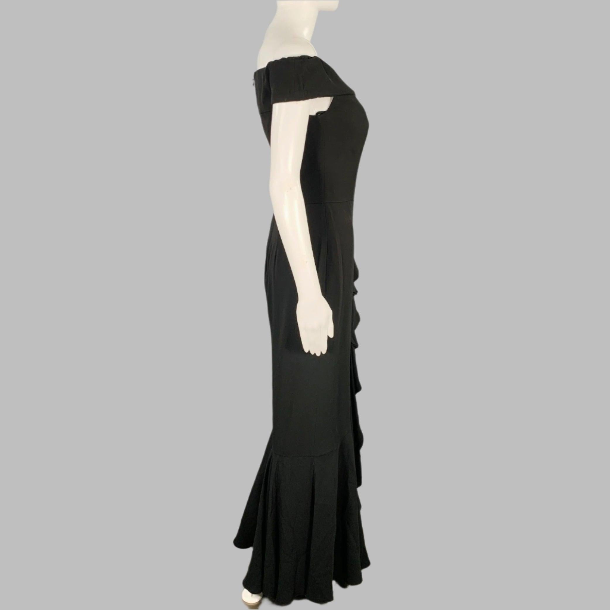 ALEXANDER MCQUEEN evening gown
in a black viscose blend featuring a form fitting skirt with ruffle detail, off shoulder design, and built in bustier. Made in Italy.New with Tags. 

Marked:   IT 40 

Measurements: 
  Bust: 30 inches Waist: 27 inches