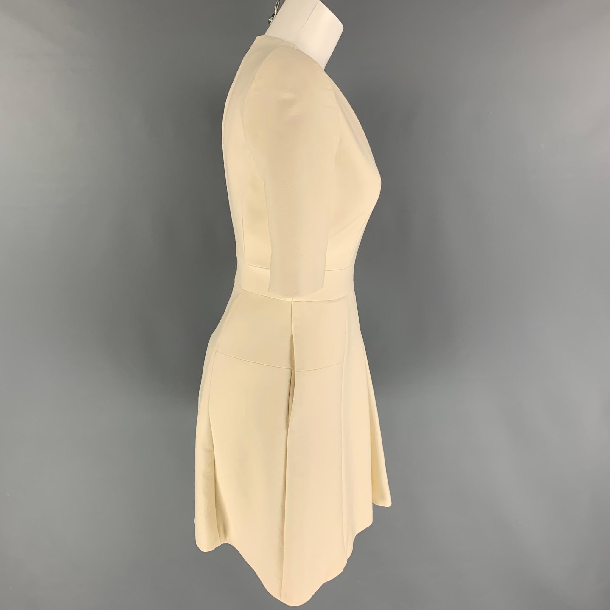 ALEXANDER McQUEEN dress comes in a cream wool blend featuring a v-neck, pleated, short sleeves, and a back zip up closure. Made in Italy. 

Very Good Pre-Owned Condition.
Marked: 40

Measurements:

Shoulder: 15 in.
Bust: 33 in.
Waist: 36 in.
Hip: 36