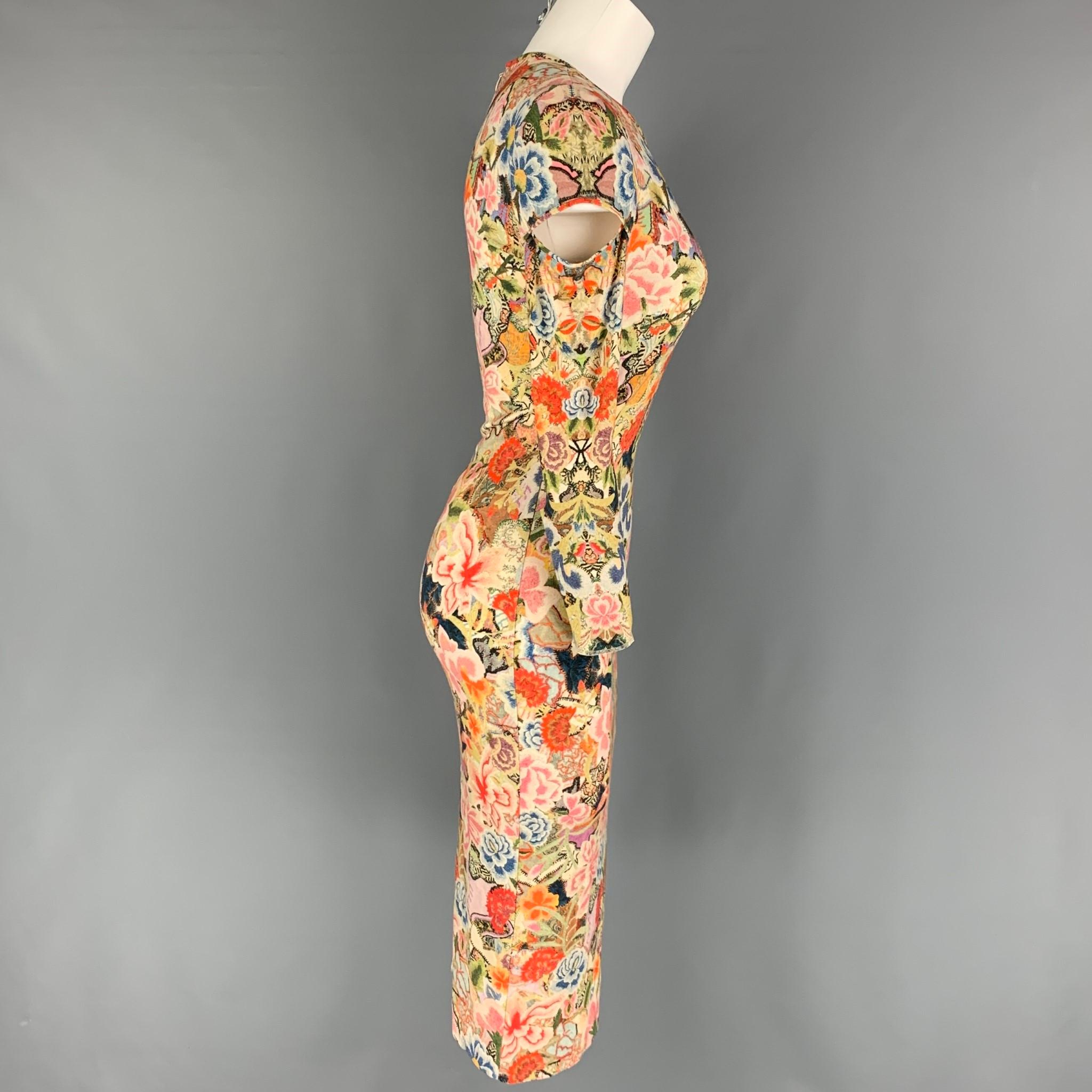 ALEXANDER McQUEEN dress comes in a multi-color abstract floral rayon blend featuring shoulder cut-out details, crew-neck, and a back zip up closure. Made in Italy.

Very Good Pre-Owned Condition.
Marked: 40

Measurements:

Shoulder: 15 in.
Bust: 30