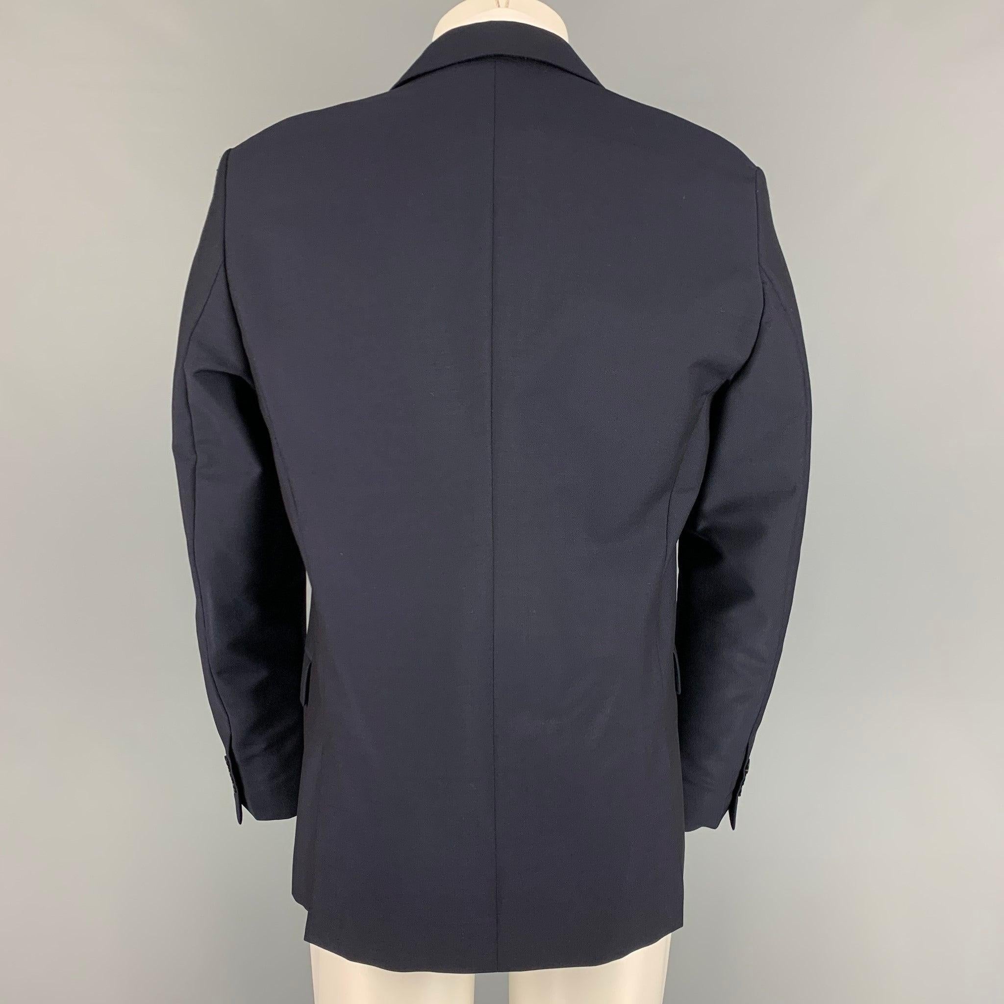 ALEXANDER MCQUEEN - Manteau de sport en laine et mohair bleu marine à revers clouté, taille 42 Bon état - En vente à San Francisco, CA