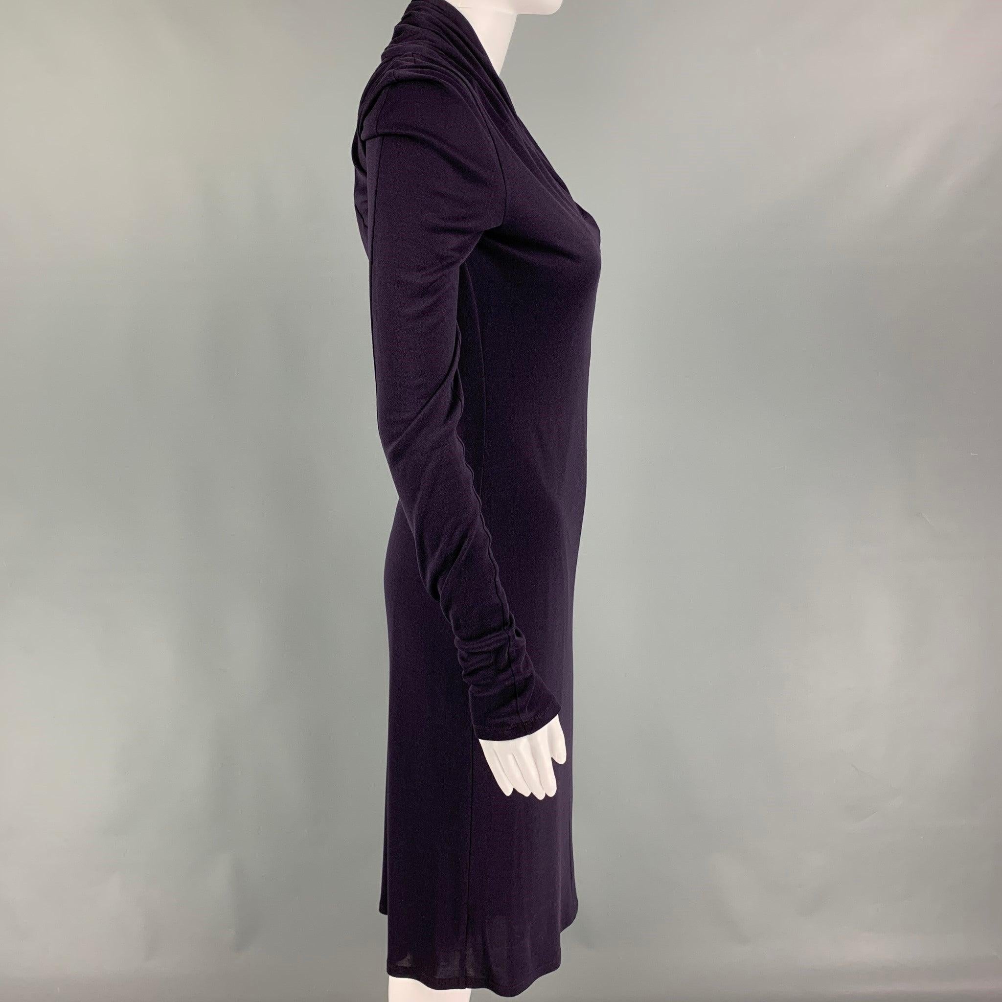 ALEXANDER McQUEEN dress comes in a purple viscose featuring long sleeve and a v-neck. Made in Italy.
Very Good
Pre-Owned Condition. light wear at front. As-is. 

Marked:  42 

Measurements: 
 
Shoulder: 16 inches Bust: 30 inches Waist: 25 inches
