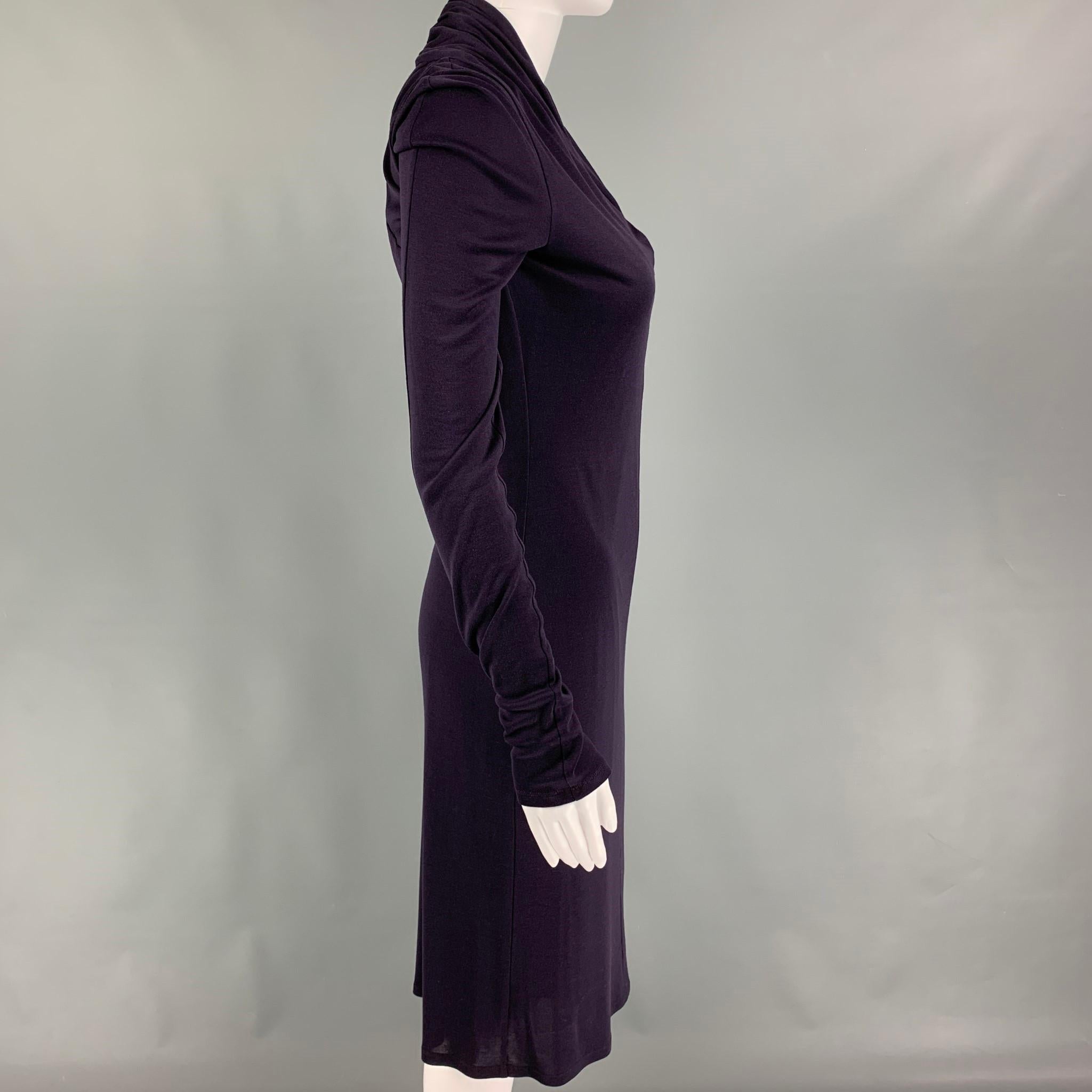 ALEXANDER McQUEEN dress comes in a purple viscose featuring long sleeve and a v-neck. Made in Italy. 

Very Good Pre-Owned Condition. light wear at front. As-is.
Marked: 42
Original Retail Price: $1,150.00

Measurements:

Shoulder: 16 in.
Bust: 30