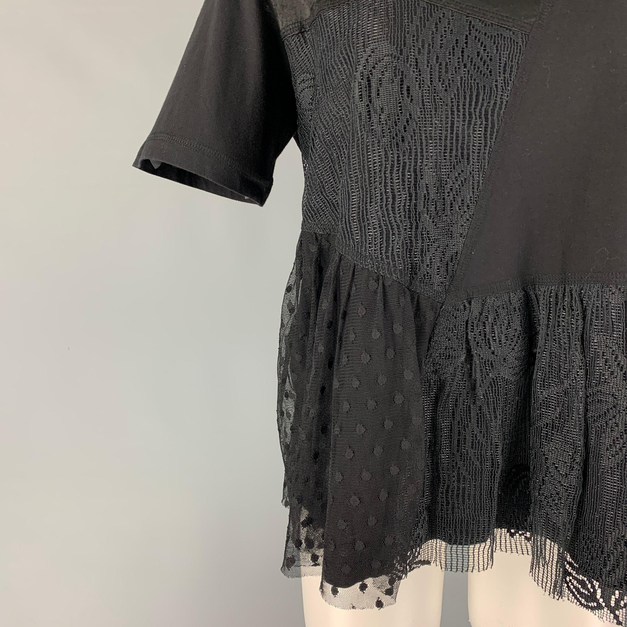MCQ by ALEXANDER McQUEEN top comes in a black polyester featuring a lace panel, short sleeves, and a crew-neck. 

Excellent Pre-Owned Condition.
Marked: M

Measurements:

Shoulder: 17 in.
Bust: 38 in.
Sleeve: 9.5 in.
Length: 23 in.