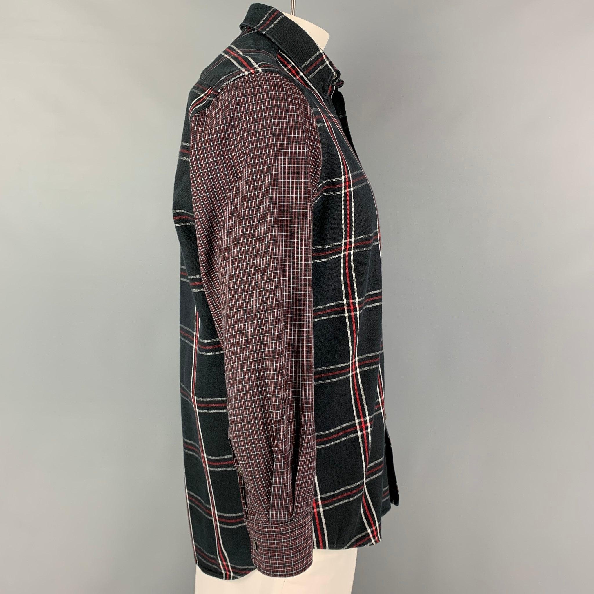 MCQ by ALEXANDER McQUEEN long sleeve shirt comes in a black & red plaid cotton featuring a button down collar, patch pocket, and a button up closure.
Very Good Pre-Owned Condition. Missing single button. As-is.  

Marked:   IT 50 

Measurements: 
