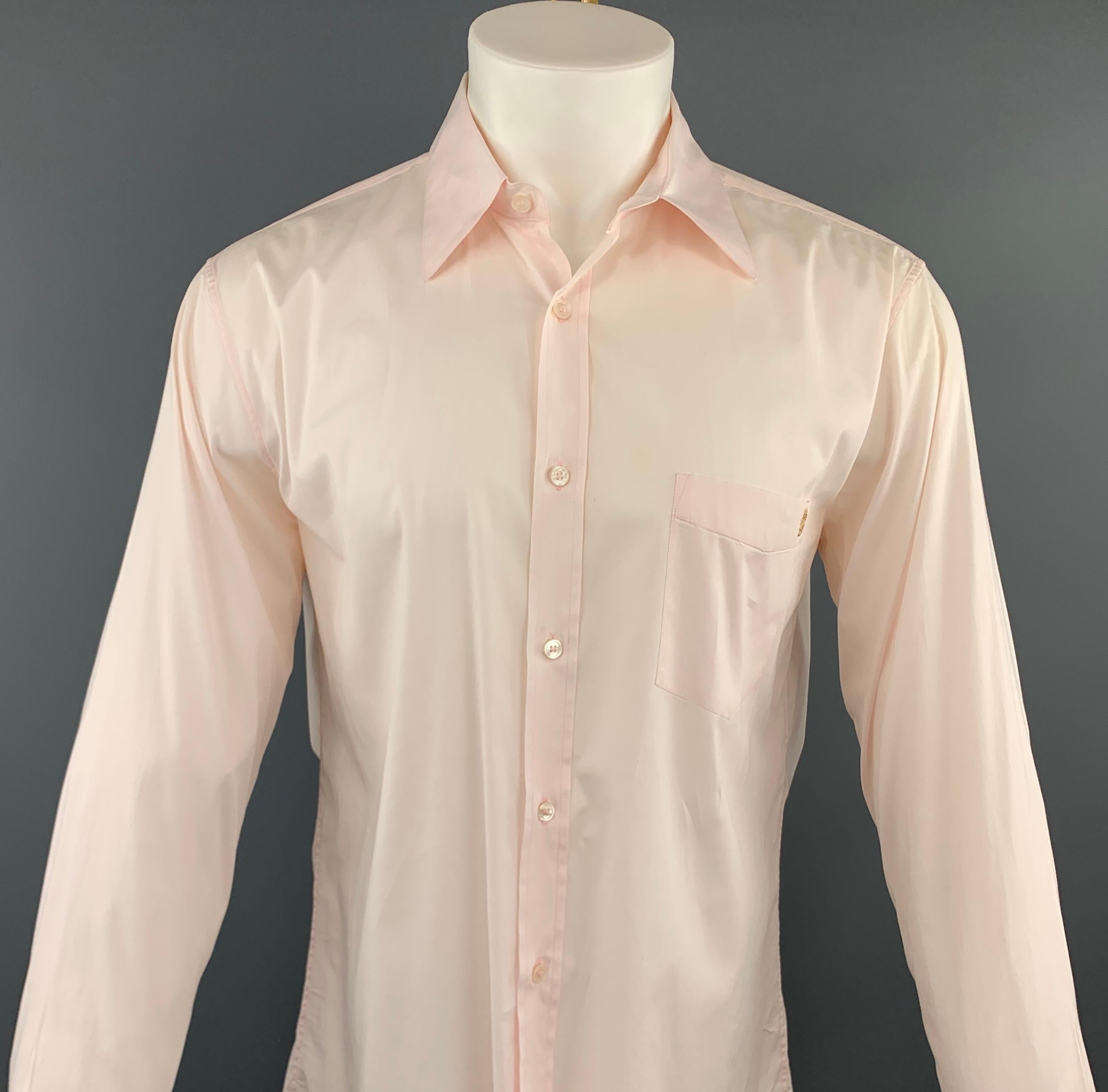 ALEXANDER MCQUEEN long sleeve shirt comes in a light pink cotton featuring a button up style, skull embroidered detail, and a front patch pocket. Made in Italy.
 
Excellent Pre-Owned Condition.
Marked: 50
 
Measurements:
 
Shoulder: 19 in.
Chest: 48