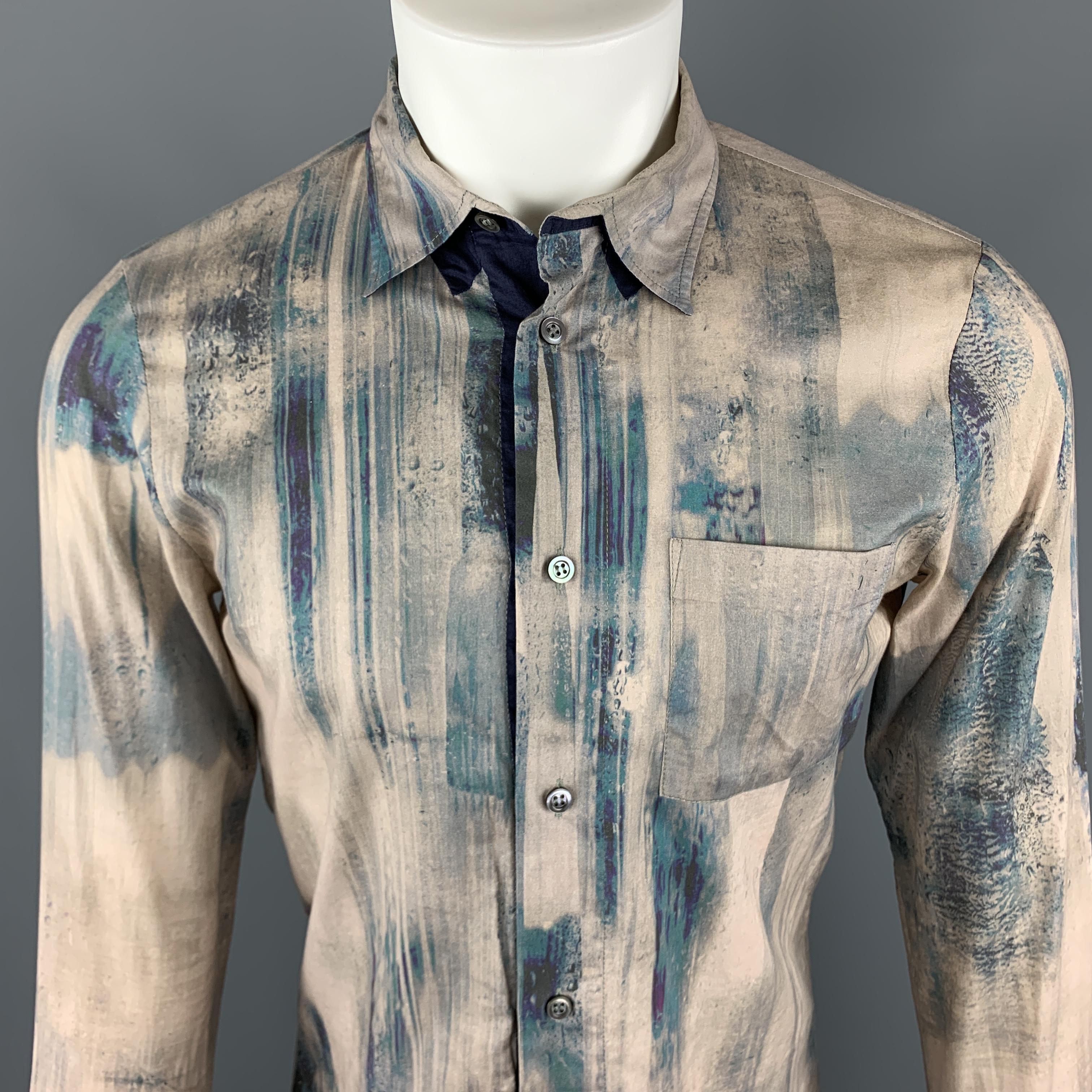 ALEXANDER MCQUEEN Long Sleeve Shirt comes in an abstract print beige and navy cotton material, with a classic collar, a navy trim at inner closure, a patch pocket, buttoned cuffs, button up. Light spot at back of left cuff. Made in Italy.

Very Good