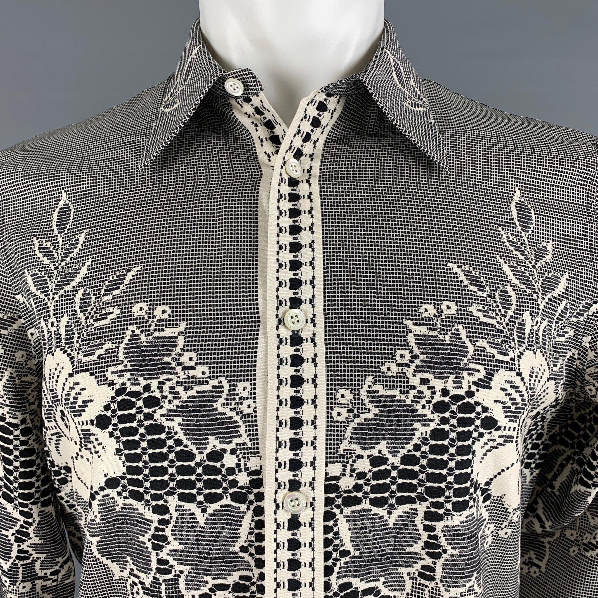 ALEXANDER McQUEEN long sleeve shirt comes in a black and beige lace print cotton woven material featuring a straight collar and a button up closure. Made in Italy.Excellent Pre-Owned Condition.  

Marked:   S 

Measurements: 
 
Shoulder: 17 inches