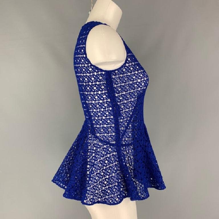 ALEXANDER MCQUEEN peplum sleeveless blouse comes in blue lace fabric featuring a full invisible zip up closure at left side. Made in Italy.Very Good Pre-Owned Condition. Fabric and size tags removed. 

Marked:   no size marked 

Measurements: 
