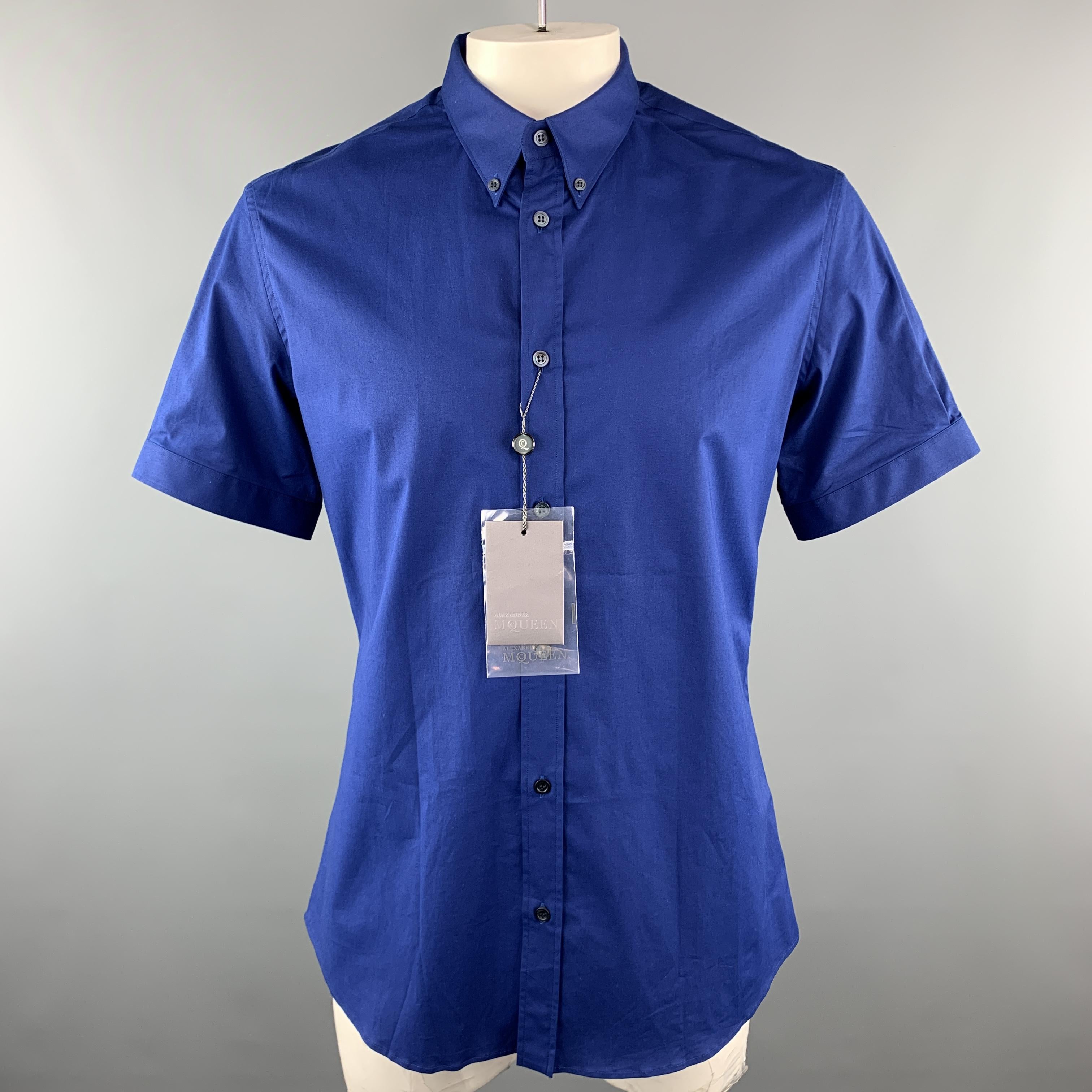 ALEXANDER MCQUEEN Short Sleeve Shirt comes in a blue tone in a solid cotton material, with a pointed collar, double button at sleeve, button down. Made in Romania.
 
New With Tags.
Marked: IT 54
 
Measurements:
 
Shoulder: 17 in.  
Chest: 48