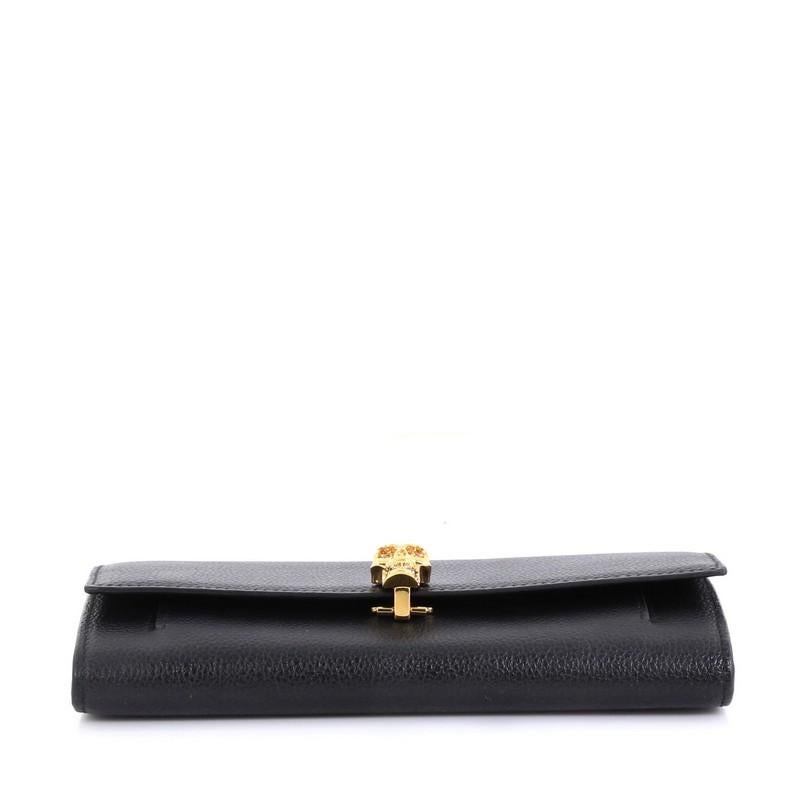 alexander mcqueen wallet on chain