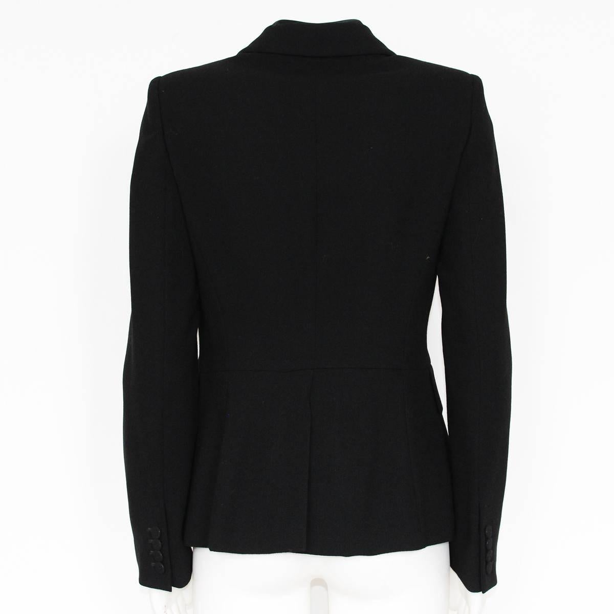 Beautiful and chic jacket by Alexander McQueen
Wool (90%) and cotton
Black color
Silk revers
Single buttons
Two pockets
Length from shoulder cm 58 (22.8 inches)
Worldwide express shipping included in the price !