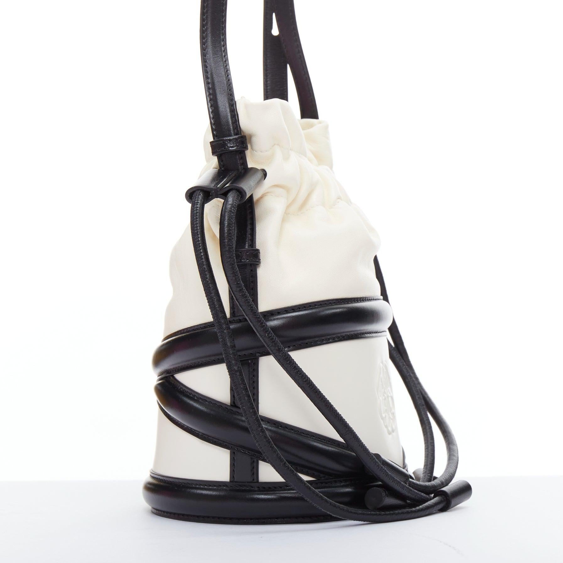 ALEXANDER MCQUEEN Soft Curve AM logo black white leather bucket bag In Good Condition For Sale In Hong Kong, NT