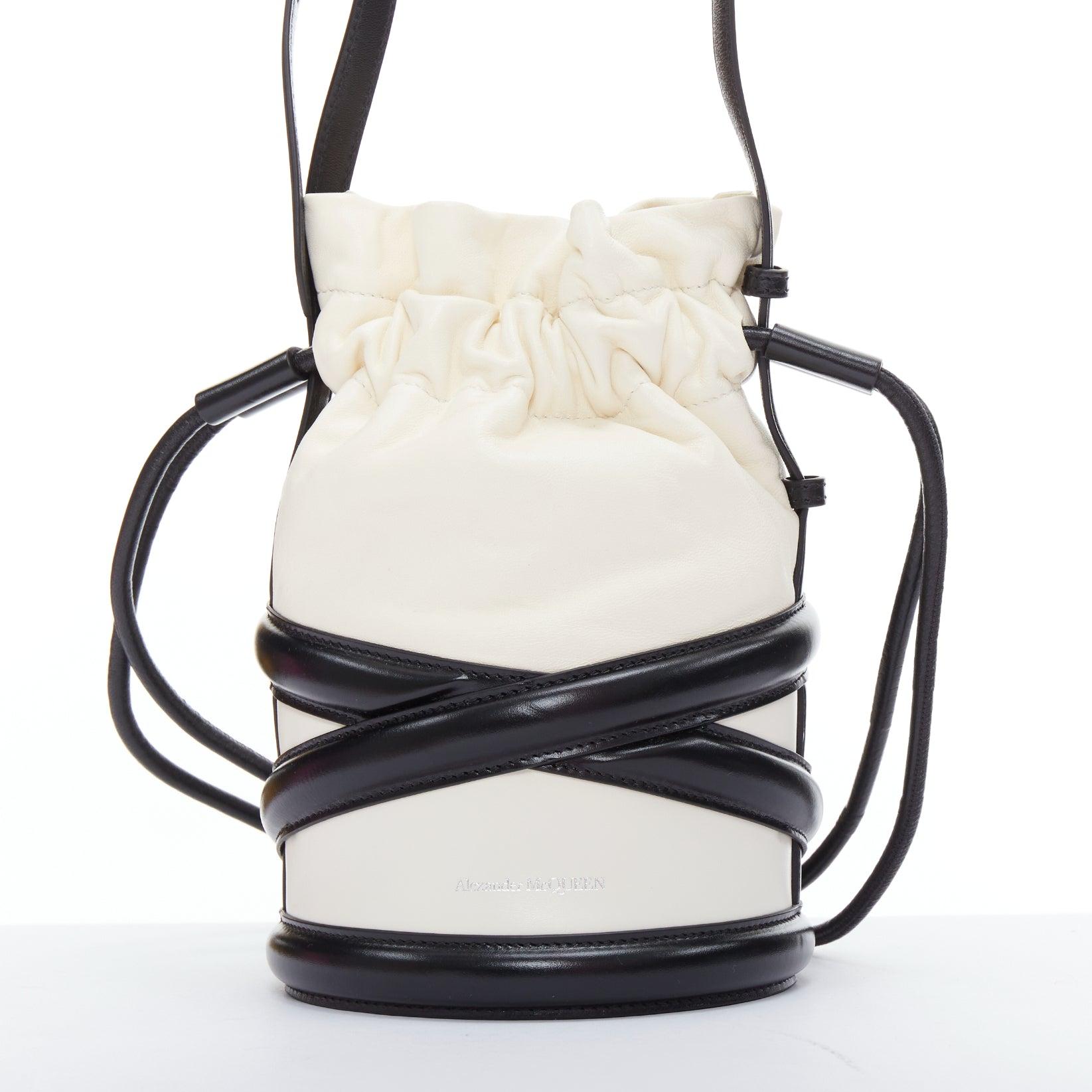 Women's ALEXANDER MCQUEEN Soft Curve AM logo black white leather bucket bag For Sale