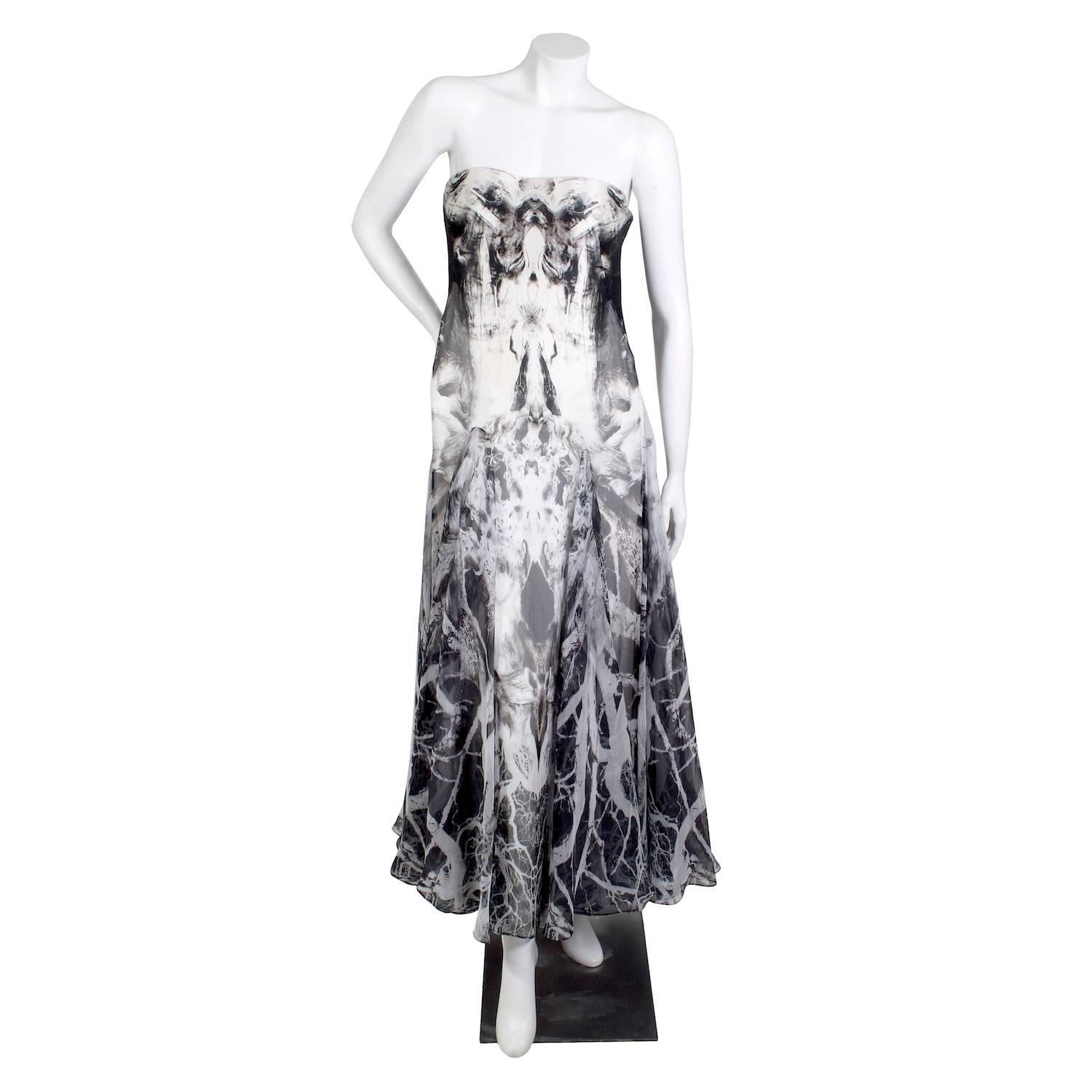 Product Details:
Strapless dress by Alexander McQueen from 2010
The print was designed by Tim Holloway, an intern at Alexander McQueen in 2010
The graphic is based on photographs Holloway took in parks around Clerkenwell, where the Alexander McQueen