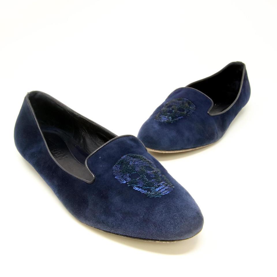 Alexander Mcqueen Suede and Sequin Skull Logo Flats

Gorgeous Blue Suede Signature Alexander McQueen with signature large skull hand stitched sequin beautiful flats with leather sole. These flats are in pre-loved Condition with basic wear on the