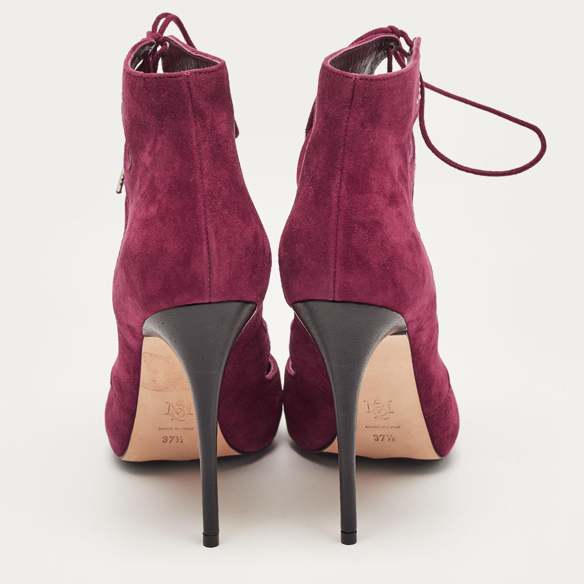 A classic pair of booties is a must-have in every collection, and when the design is by Alexander McQueen, it is sure to add a statement of luxury to your wardrobe. These ankle booties are sure to delight!

Includes: Original Box