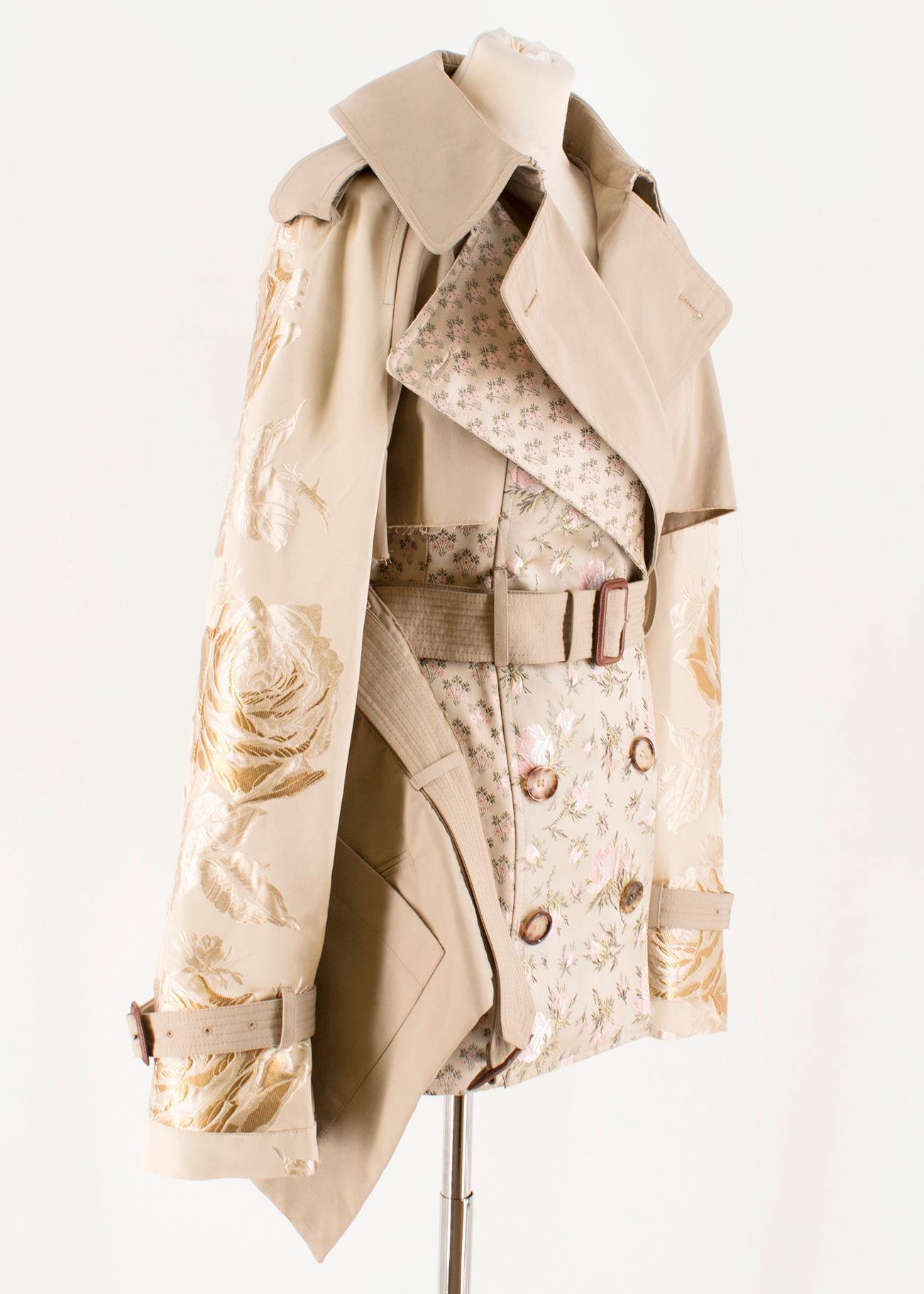 Alexander McQueen Tan Floral Embroidered Short rench Coat 

-Tan, cotton blend, mid weight fabric
-Silk lined
-Shiny embroidered floral print silk sleeves
-Pink and green floral patchwork 
-Double breasted tortoiseshell button fastening 
-Belt and