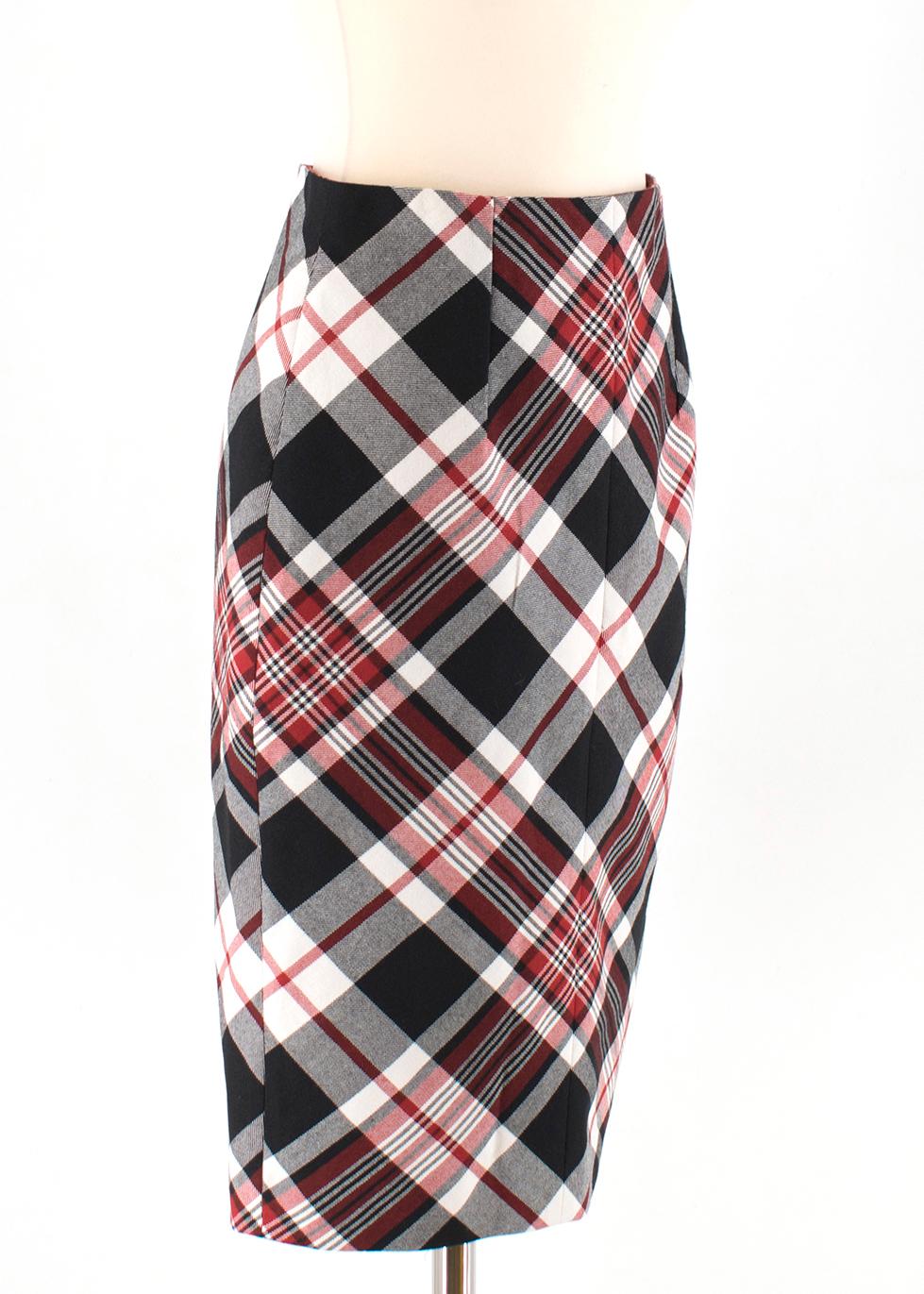 Alexander McQueen Tartan Wool Pencil Skirt

- Pencil shaped skirt
- Invisible zipper closure at the back
- Vent at the bottom back
- 100% Wool
- Fully Lined

Please note, these items are pre-owned and may show signs of being stored even when unworn