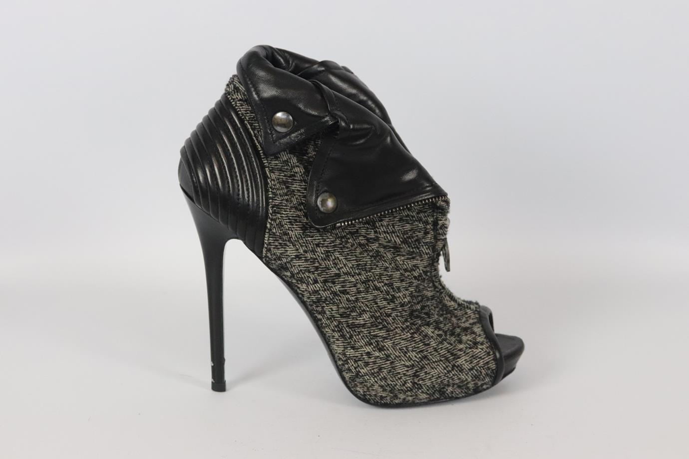 Alexander Mcqueen tweed and leather peep toe ankle boots. Black and grey. Zip fastening at front. Does not come with dustbag or box. Size: EU 38 (UK 5, US 8) Insole: 9.4 in. Heel height: 3.5 in. Shaft: 3.8 in. Good condition - Some wear to soles and